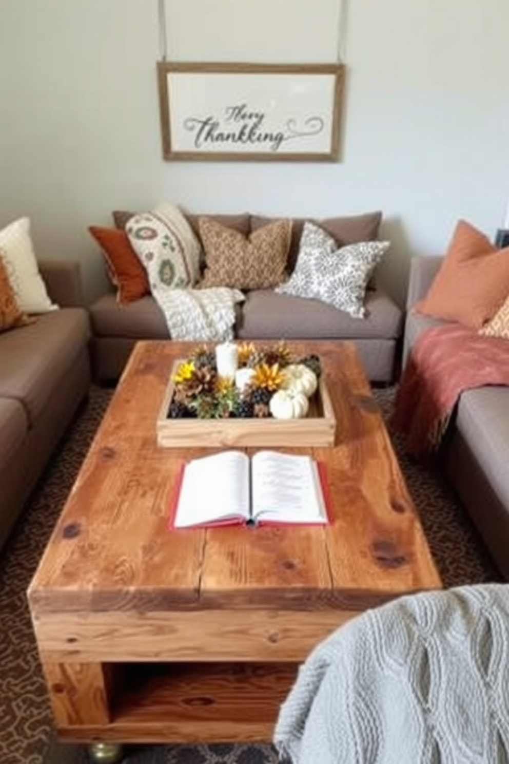 A rustic coffee table made of reclaimed wood is adorned with seasonal decor for Thanksgiving. Surrounding it, cozy cushions and a soft throw blanket create an inviting reading nook perfect for enjoying a good book.