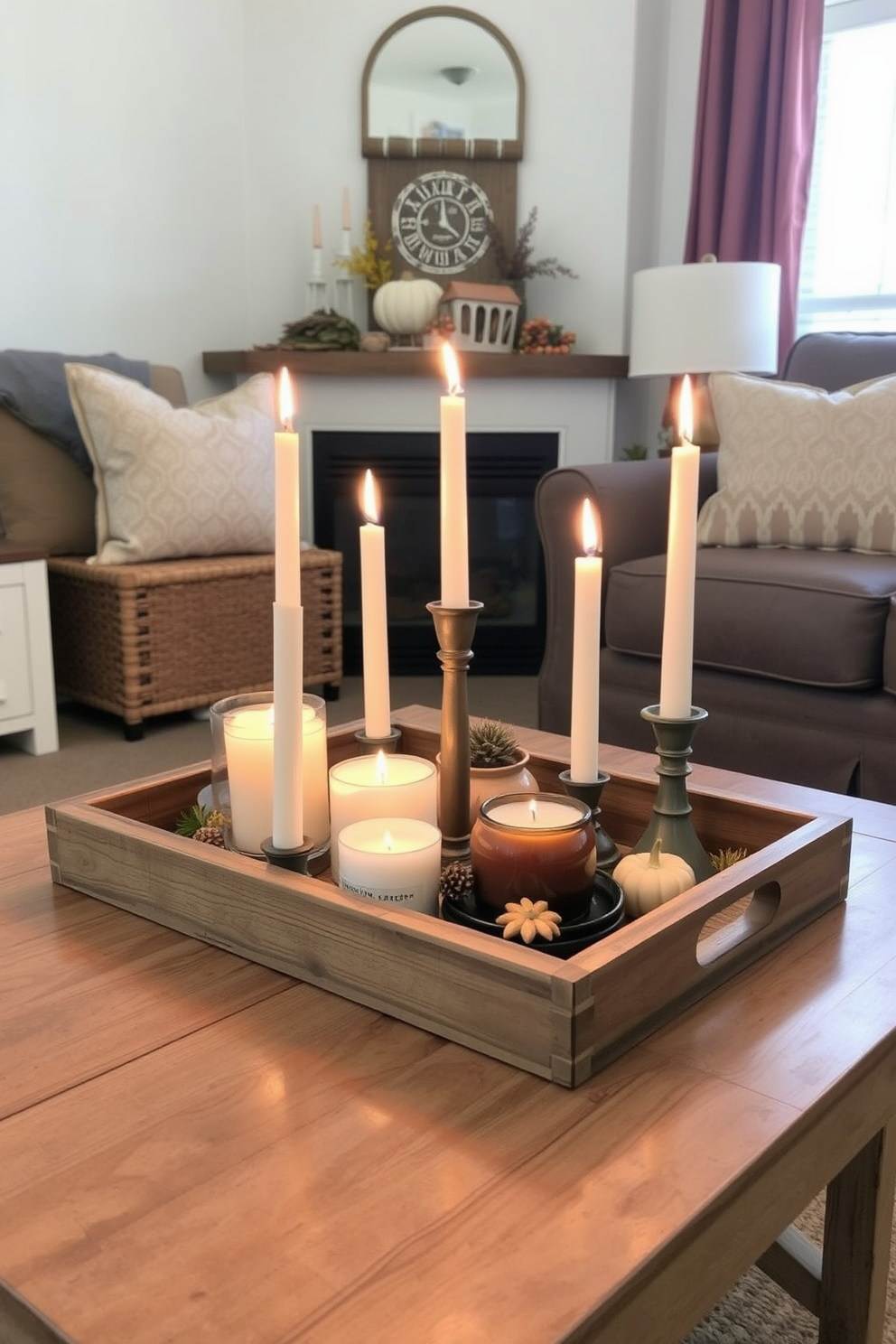 A rustic wooden tray is placed at the center of a cozy small living room. It holds an assortment of candles in varying heights, creating a warm and inviting ambiance for Thanksgiving.