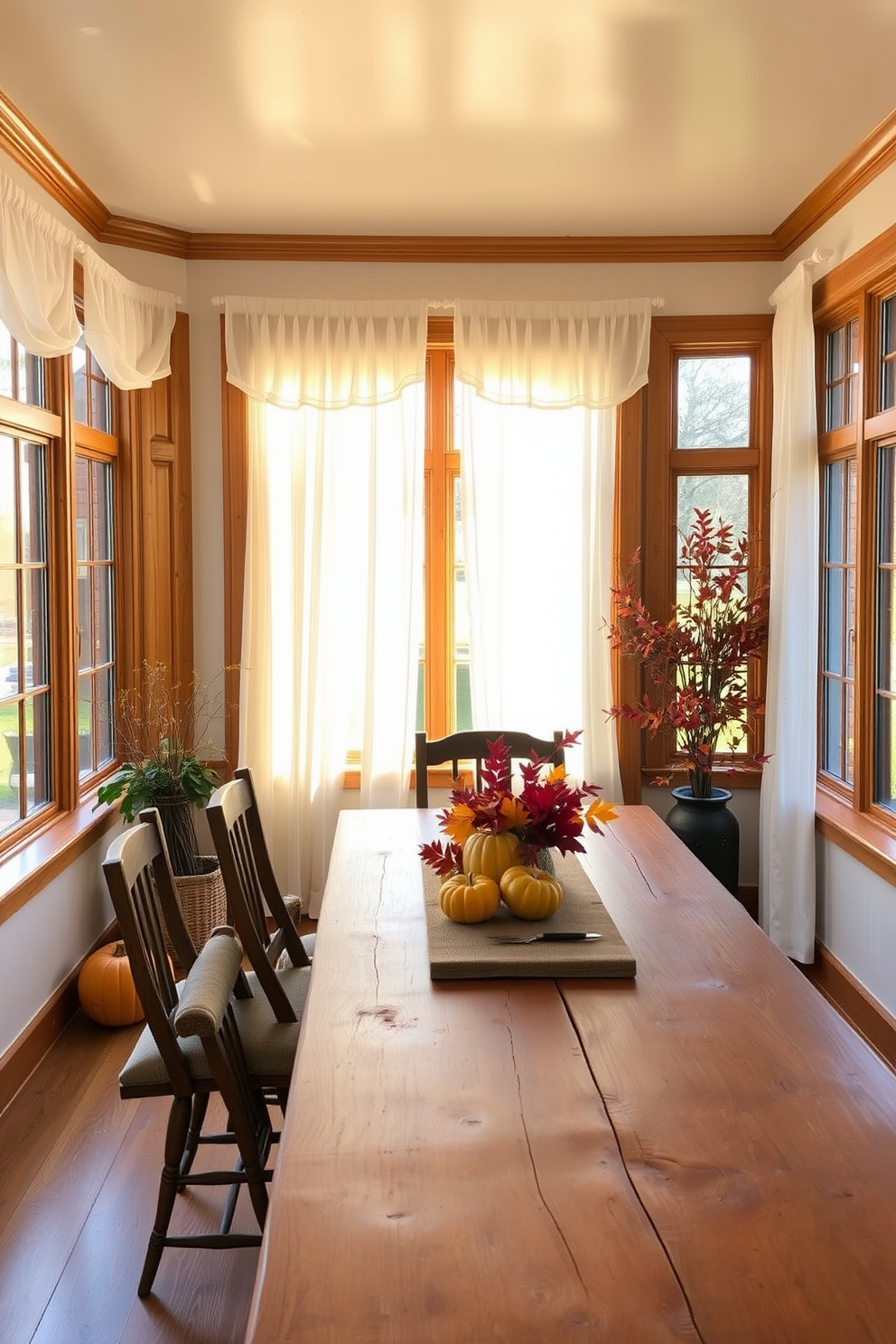 A cozy sunroom filled with natural light. The space features large windows adorned with sheer white curtains, allowing the golden glow of the Thanksgiving sun to filter in. Natural wood accents are present in the furniture and trim, creating a warm and inviting atmosphere. A rustic wooden dining table is set with autumn-themed decorations, including pumpkins and vibrant fall leaves.