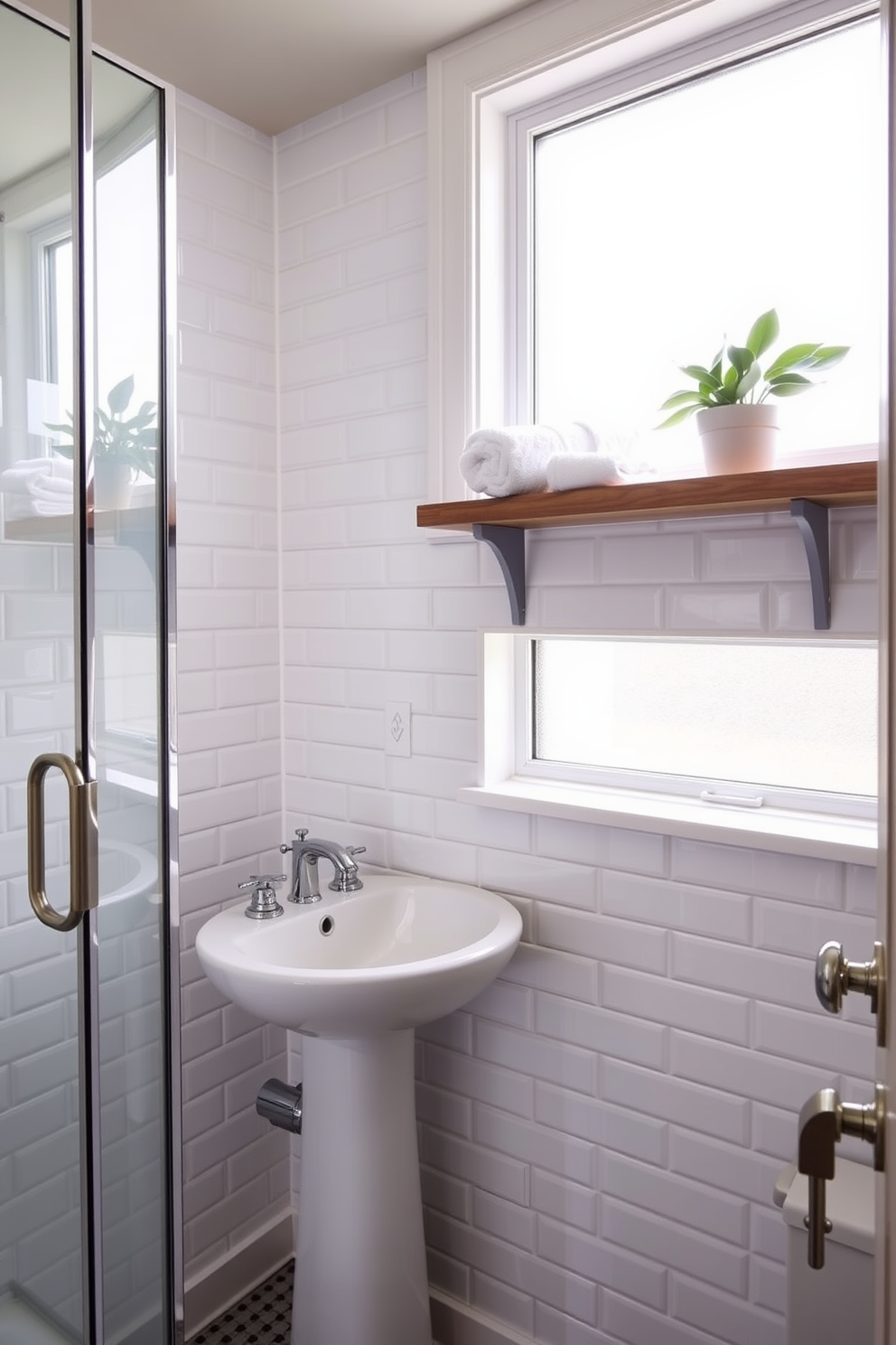 A stylish three-quarter bathroom featuring classic subway tiles on the walls. The design includes a sleek white pedestal sink and a compact shower area with a glass door. Natural light floods the space through a frosted window, highlighting the elegant fixtures in polished chrome. A wooden shelf above the sink holds neatly rolled towels and a small potted plant for a touch of greenery.