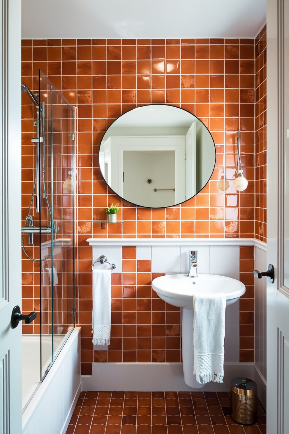 A stylish three-quarter bathroom featuring vintage tiles in a warm terracotta hue, creating a cozy and inviting atmosphere. The space is enhanced by contemporary accents like a sleek glass shower enclosure and modern fixtures that contrast beautifully with the traditional tiles. The walls are adorned with white wainscoting, adding a touch of elegance to the design. A floating vanity with a polished chrome faucet complements the vintage tiles, while a large round mirror reflects natural light, making the space feel brighter and more spacious.