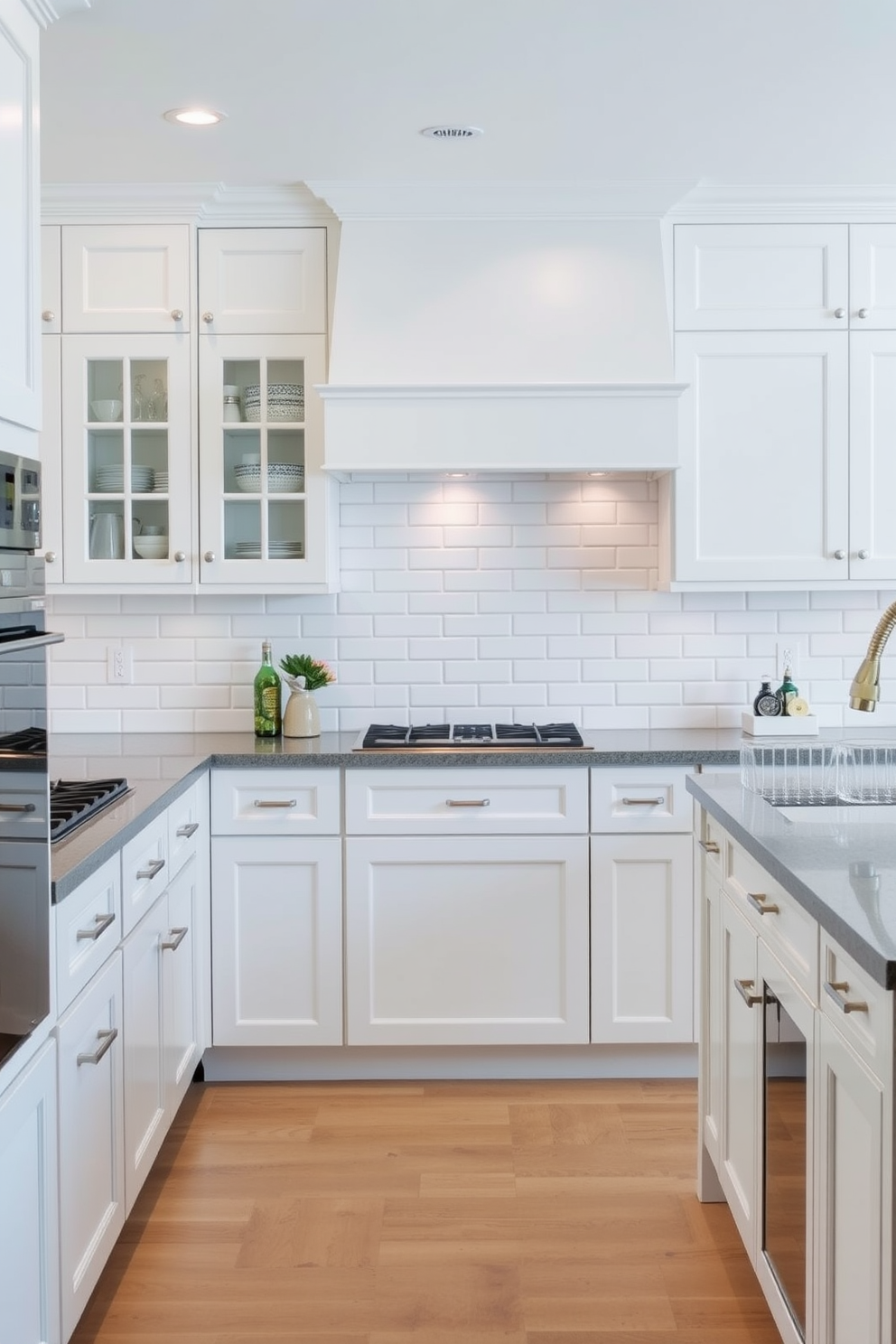 A timeless kitchen design featuring a subway tile backsplash that enhances the clean aesthetic of the space. The cabinetry is painted in a soft white, complemented by brushed nickel hardware and a spacious island with bar seating.