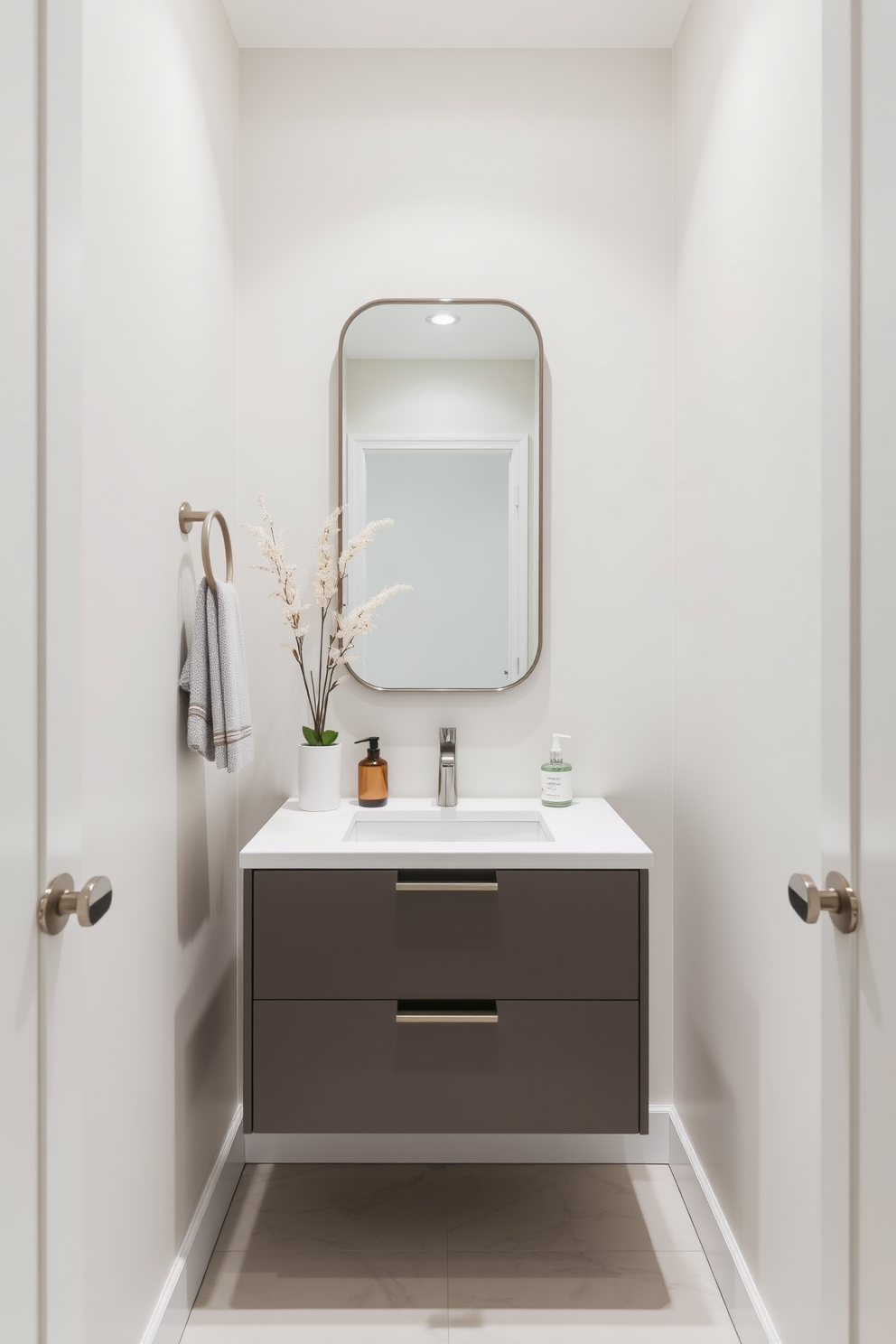 A sleek floating vanity is mounted against a wall, creating an open space feel in the tiny powder room. The vanity features a minimalist design with a light wood finish and a white sink, complemented by modern fixtures. The walls are adorned with a soft pastel color, enhancing the room's brightness and spaciousness. A large round mirror hangs above the vanity, reflecting light and giving the illusion of depth in the compact area.