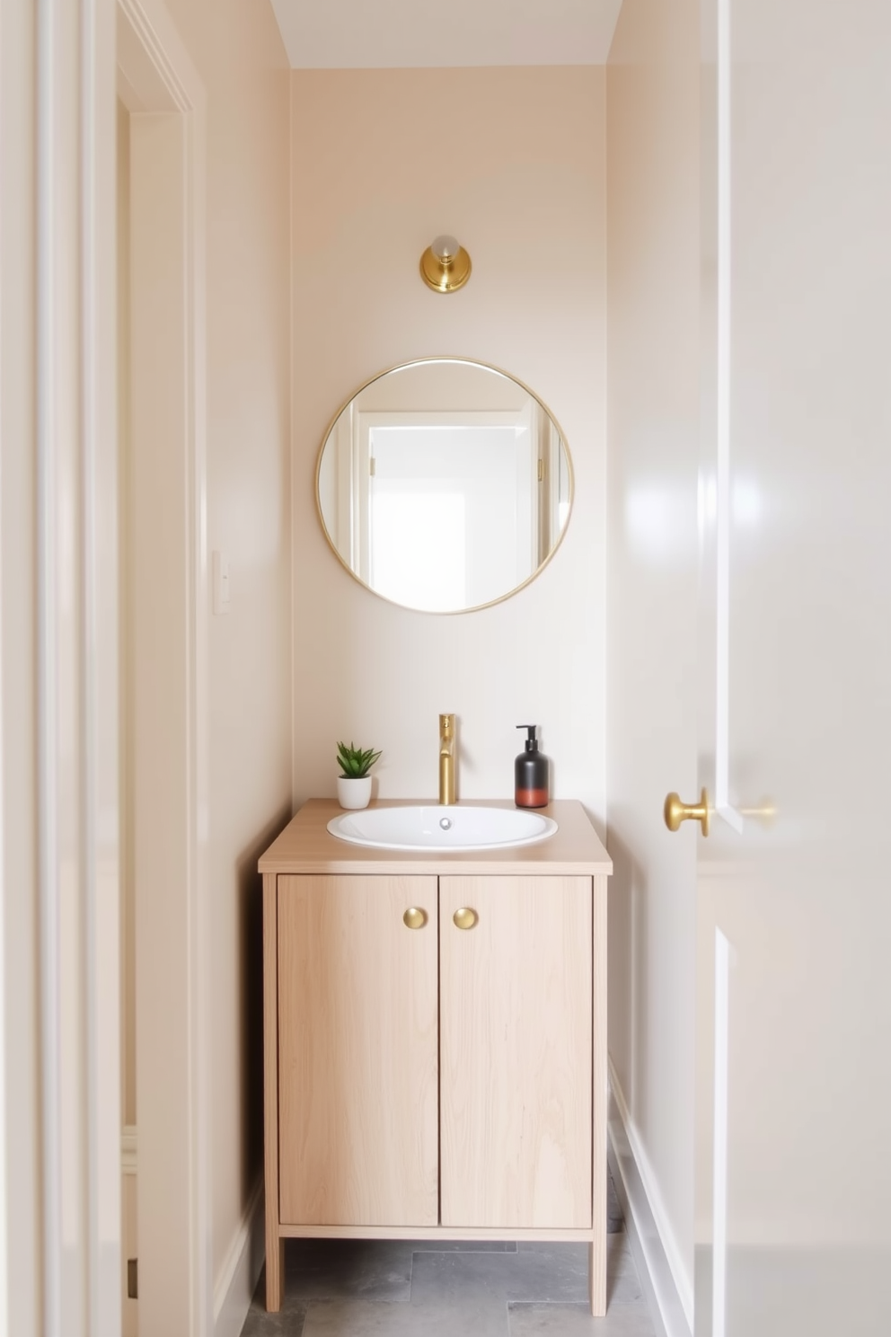 A sleek modern faucet design is installed above a compact sink in a tiny powder room. The walls are adorned with textured wallpaper in soft neutral tones, while the floor features elegant geometric tiles. A floating vanity with a minimalist design complements the modern aesthetic, providing both style and functionality. A round mirror with integrated lighting reflects the contemporary fixtures, enhancing the room's spacious feel.