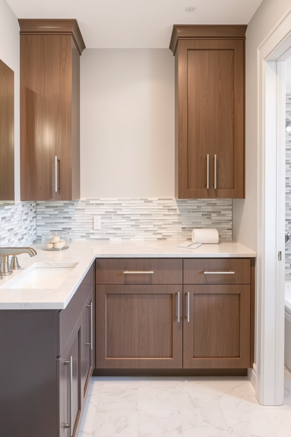 A transitional bathroom design featuring a subway tile backsplash that adds texture and depth to the space. The sleek cabinetry complements the modern aesthetic while providing ample storage and functionality.