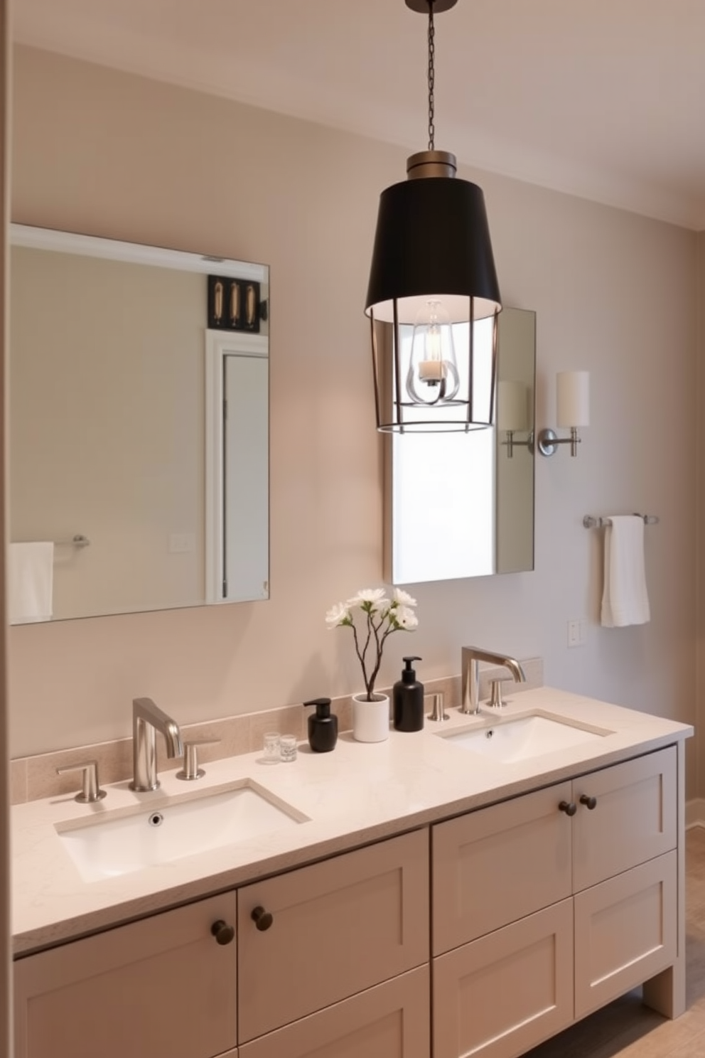 A double vanity features a sleek design with a stylish pendant light hanging above. The space is adorned with neutral tones and elegant fixtures, creating a warm and inviting atmosphere.