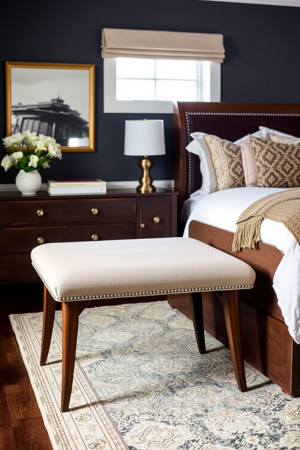 A stylish bench at the foot of the bed complements the transitional bedroom design. The bench features a soft upholstered seat in a neutral tone, paired with elegant wooden legs that add warmth to the space.