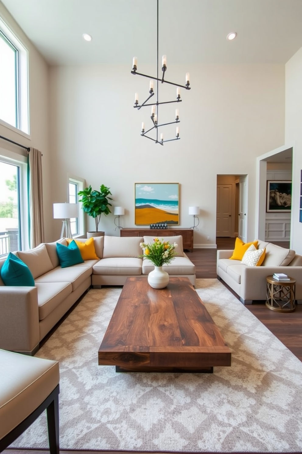 A transitional living room featuring a neutral color palette accented with bold pops of color. The space includes a large sectional sofa in a soft beige fabric paired with vibrant throw pillows in shades of teal and mustard yellow. A sleek coffee table made of reclaimed wood sits in the center, surrounded by an area rug with geometric patterns. Floor-to-ceiling windows allow natural light to flood the room, highlighting the artwork on the walls and the stylish lighting fixtures above.