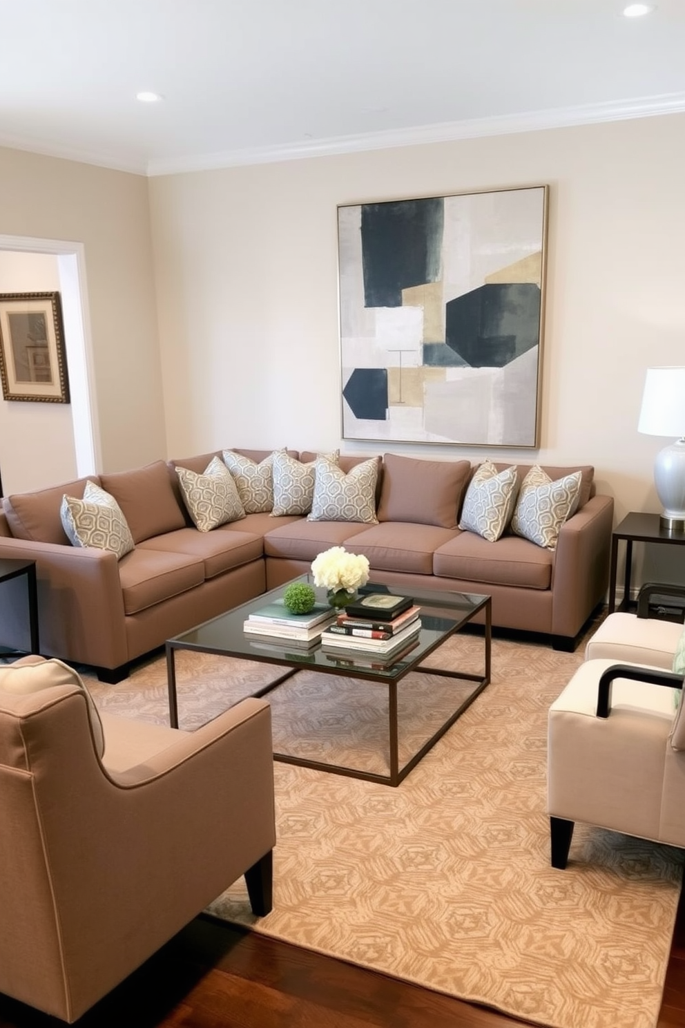 A transitional living room that seamlessly blends modern and traditional elements. The space features a comfortable sectional sofa adorned with geometric patterned throw pillows, complemented by a sleek coffee table with a glass top. The walls are painted in a soft beige, creating a warm backdrop for a large abstract art piece that incorporates geometric shapes. A plush area rug with a subtle geometric design anchors the seating area, while a pair of stylish accent chairs adds sophistication to the room.