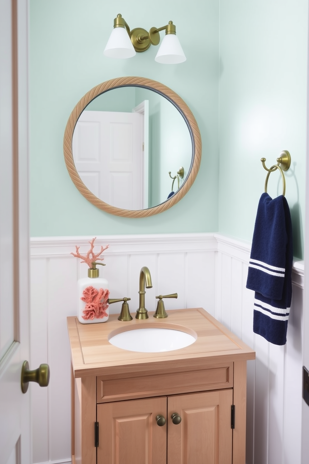 A trendy powder room featuring a monochromatic color scheme with varying shades of gray. The walls are adorned with textured wallpaper, and a sleek pedestal sink stands against the backdrop. A large round mirror with a thin black frame reflects the stylish lighting fixtures above. The floor is covered with dark gray tiles, and a small potted plant adds a touch of greenery to the space.