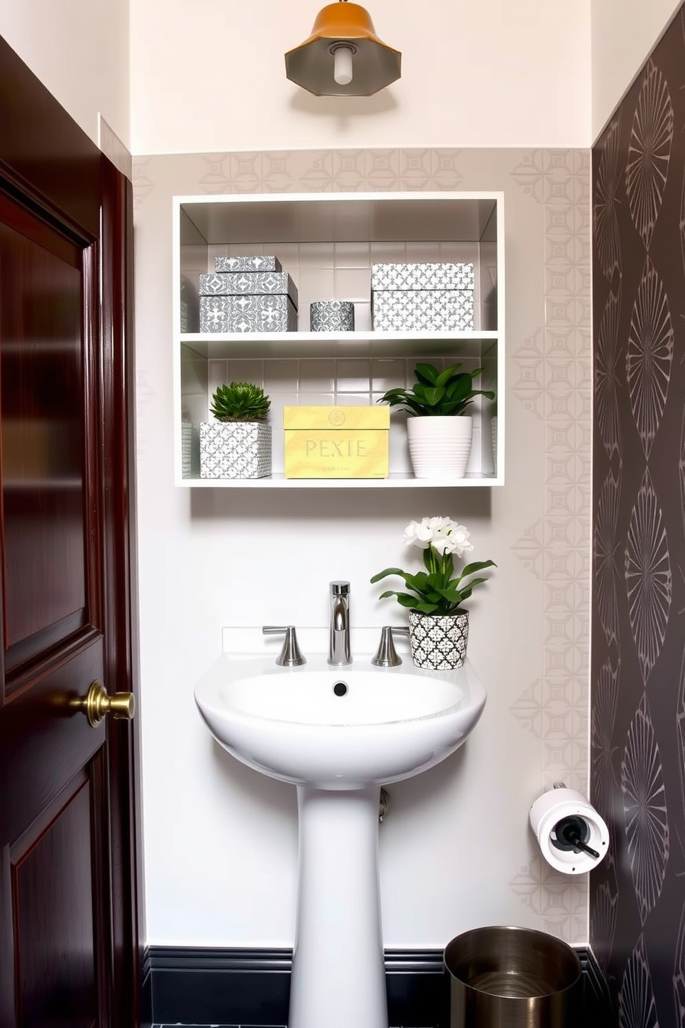 Compact storage solutions for small spaces. A sleek wall-mounted shelf holds decorative boxes and potted plants, maximizing vertical space while maintaining a clean aesthetic. Trendy powder room design ideas. The walls are adorned with bold wallpaper featuring geometric patterns, and a chic pedestal sink complements the vibrant decor.