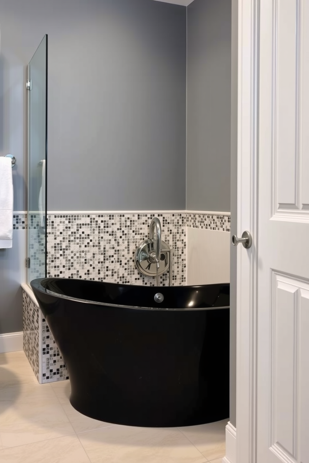 A modern bathroom featuring a floating vanity with a sleek design and a stunning vessel sink. Adjacent to the vanity, there is a stylish tub and a glass-enclosed shower combo that enhances the space's elegance.