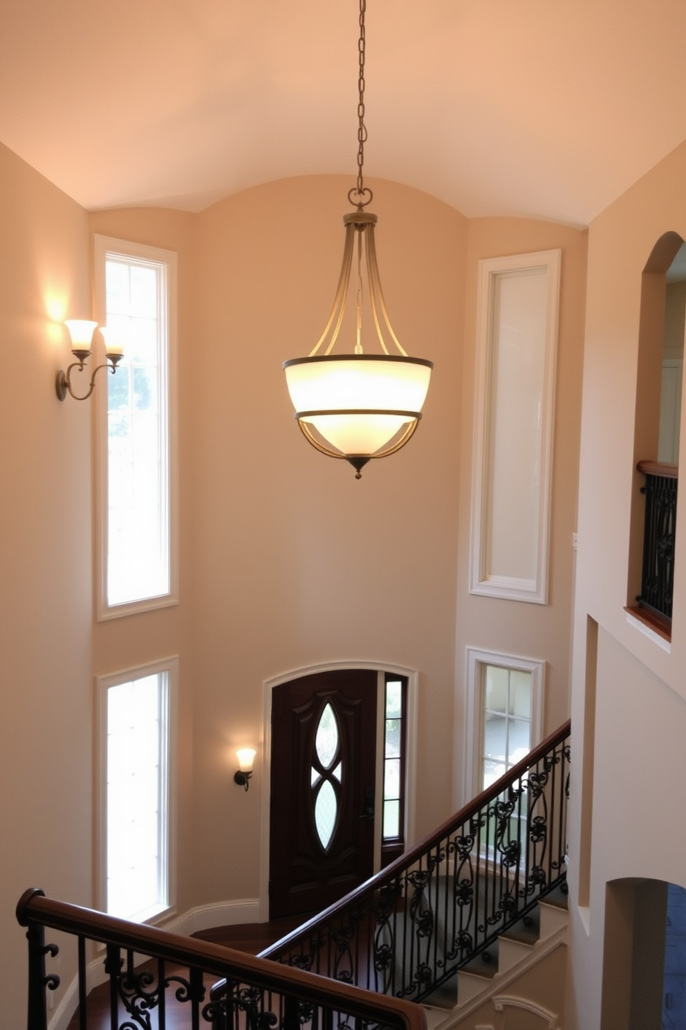 A colorful runner stretches across the polished foyer floor, guiding footsteps with its vibrant patterns. The two-story foyer features a grand chandelier hanging from a coffered ceiling, illuminating the space with a warm glow. Tall windows flank the entrance, allowing natural light to flood the area and highlight the runner's hues. A statement console table sits against the wall, adorned with fresh flowers and decorative accents that complement the overall design.