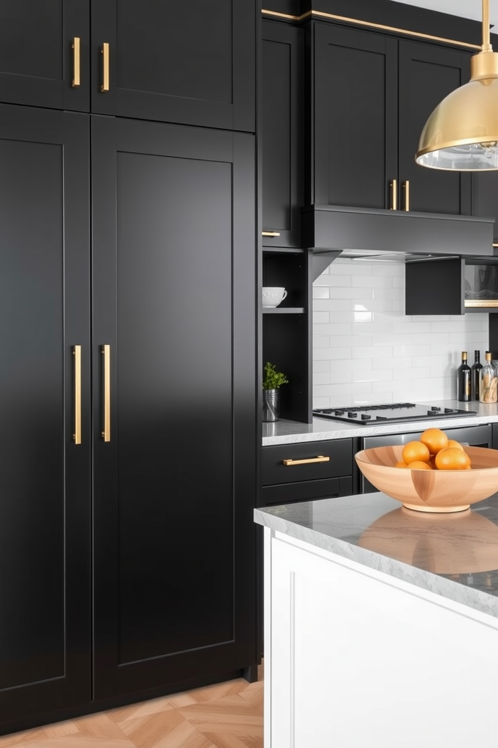 A sleek modern kitchen featuring black cabinets with elegant brass hardware. The design incorporates a stylish two-tone color scheme with contrasting white cabinetry to create visual interest and depth.