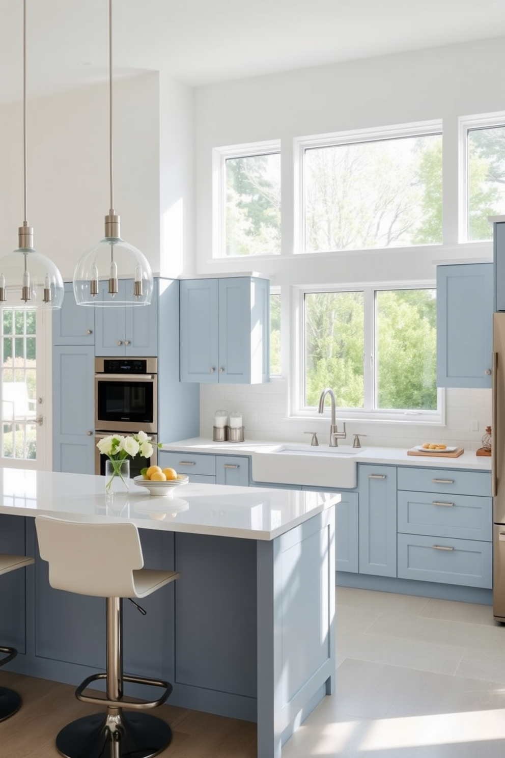 A modern kitchen featuring a soft blue and crisp white color palette. The cabinets are a serene soft blue with sleek white countertops and a stylish backsplash that complements the overall design. An island in the center provides additional workspace and features bar stools in a matching white finish. Natural light floods the space through large windows, highlighting the elegant fixtures and creating a welcoming atmosphere.