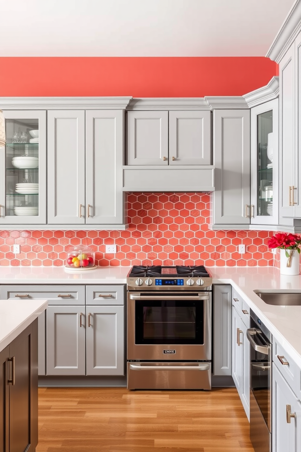 A modern kitchen featuring soft gray cabinetry complemented by vibrant coral accents throughout the space. The countertops are a sleek white quartz, and the backsplash showcases a playful coral tile pattern that adds a pop of color.