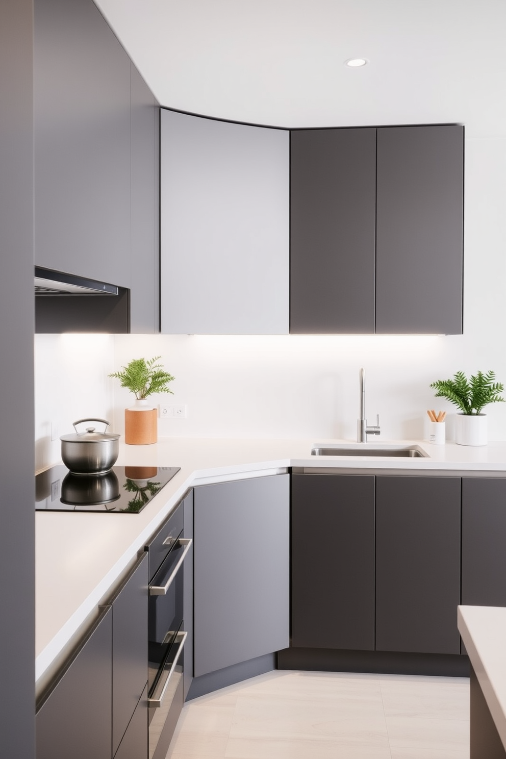 A minimalist U-shaped kitchen featuring sleek cabinetry with a matte finish. The countertops are made of polished quartz, complemented by a simple backsplash in a soft white hue.