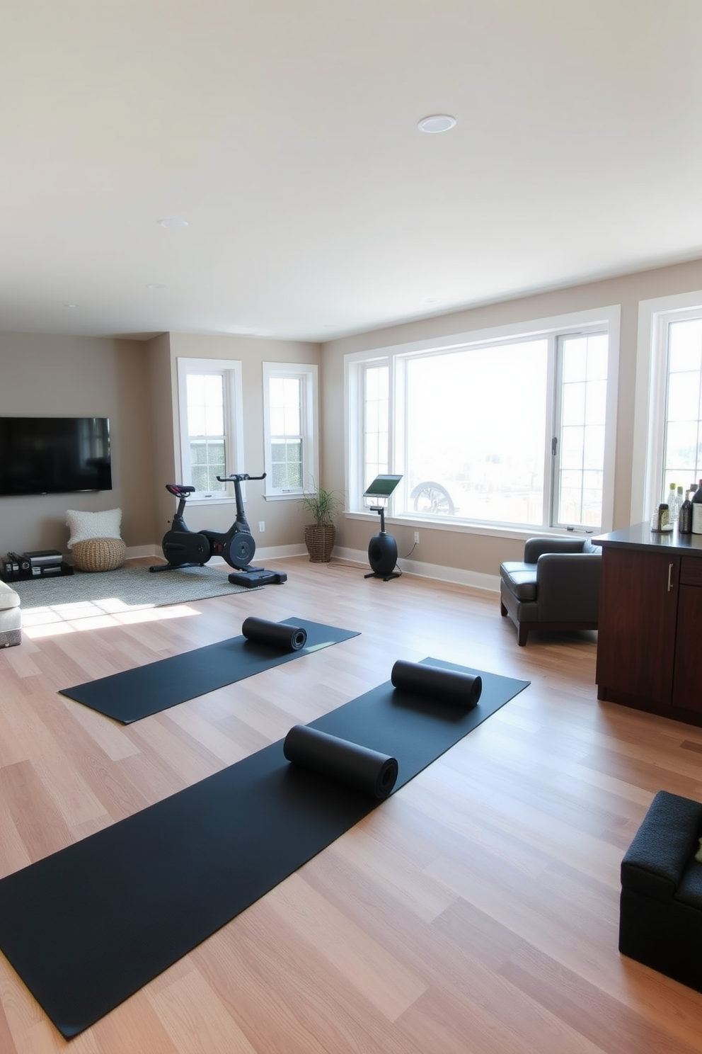 Create a workout area with yoga mats. The space features large windows allowing natural light to flood in, with soft wooden flooring and calming wall colors to create a serene atmosphere. Unfinished Basement Design Ideas. The area is transformed with functional zones including a cozy seating area, a home gym section with exercise equipment, and a small bar area for refreshments.