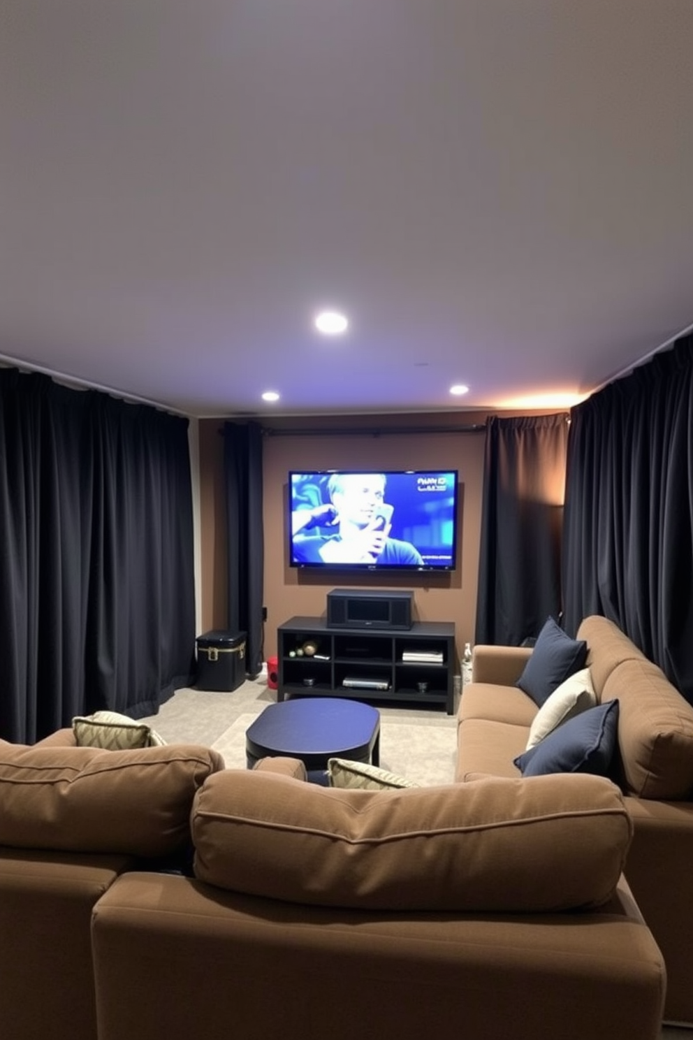 A cozy man cave in an unfinished basement featuring plush seating and a large flat-screen TV mounted on the wall. The space is enhanced by blackout curtains that provide a perfect viewing experience while maintaining privacy and comfort.