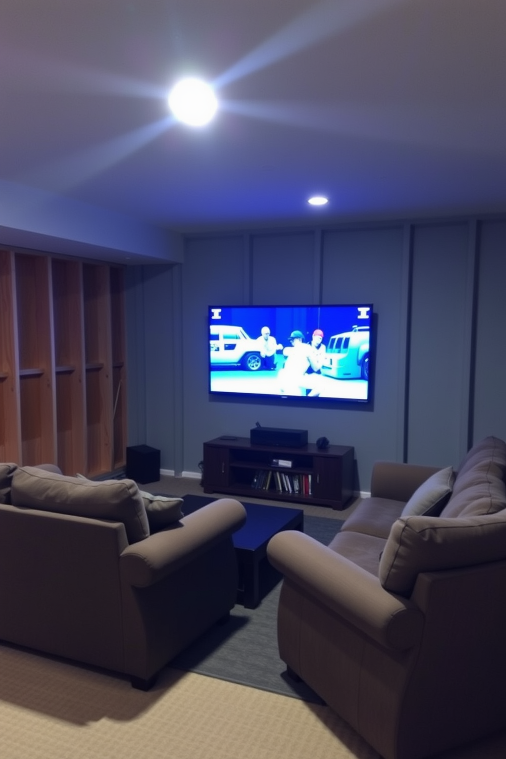 A cozy man cave setting in an unfinished basement features a wall-mounted TV positioned at eye level. Surrounding the TV is comfortable seating, including a plush sectional sofa and a couple of oversized armchairs, creating an inviting space for relaxation and entertainment.