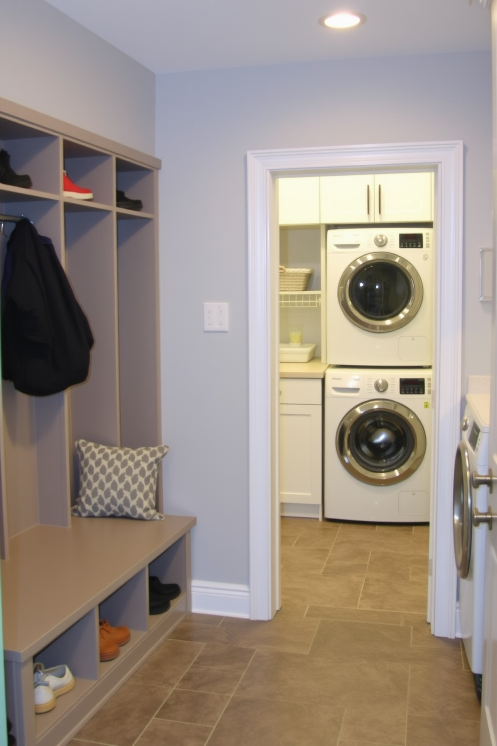 A functional mudroom area designed for shoes features built-in cubbies for storage and a bench for seating. The walls are painted a soft gray, and the floor is covered with durable tile that can withstand heavy foot traffic. The utility room laundry room combo is designed for efficiency and organization. It includes a stacked washer and dryer, a countertop for folding clothes, and cabinets above for storing laundry supplies.