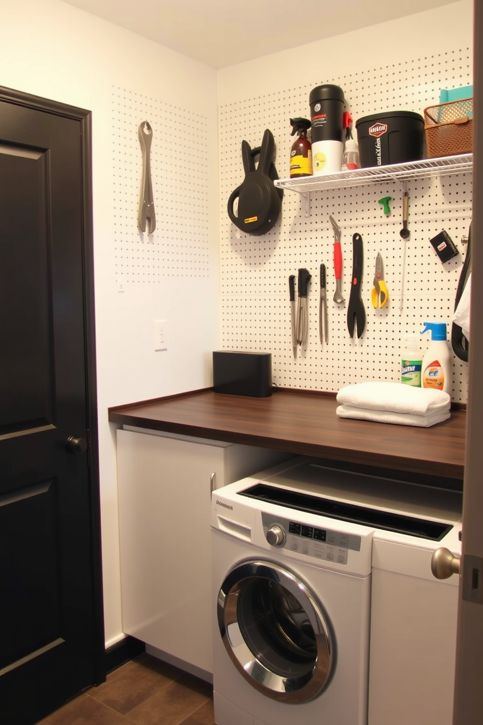 A functional utility room laundry room combo features a pegboard wall for hanging tools and supplies. The space includes a sleek washer and dryer unit, with a countertop above for folding laundry and organizing cleaning products.