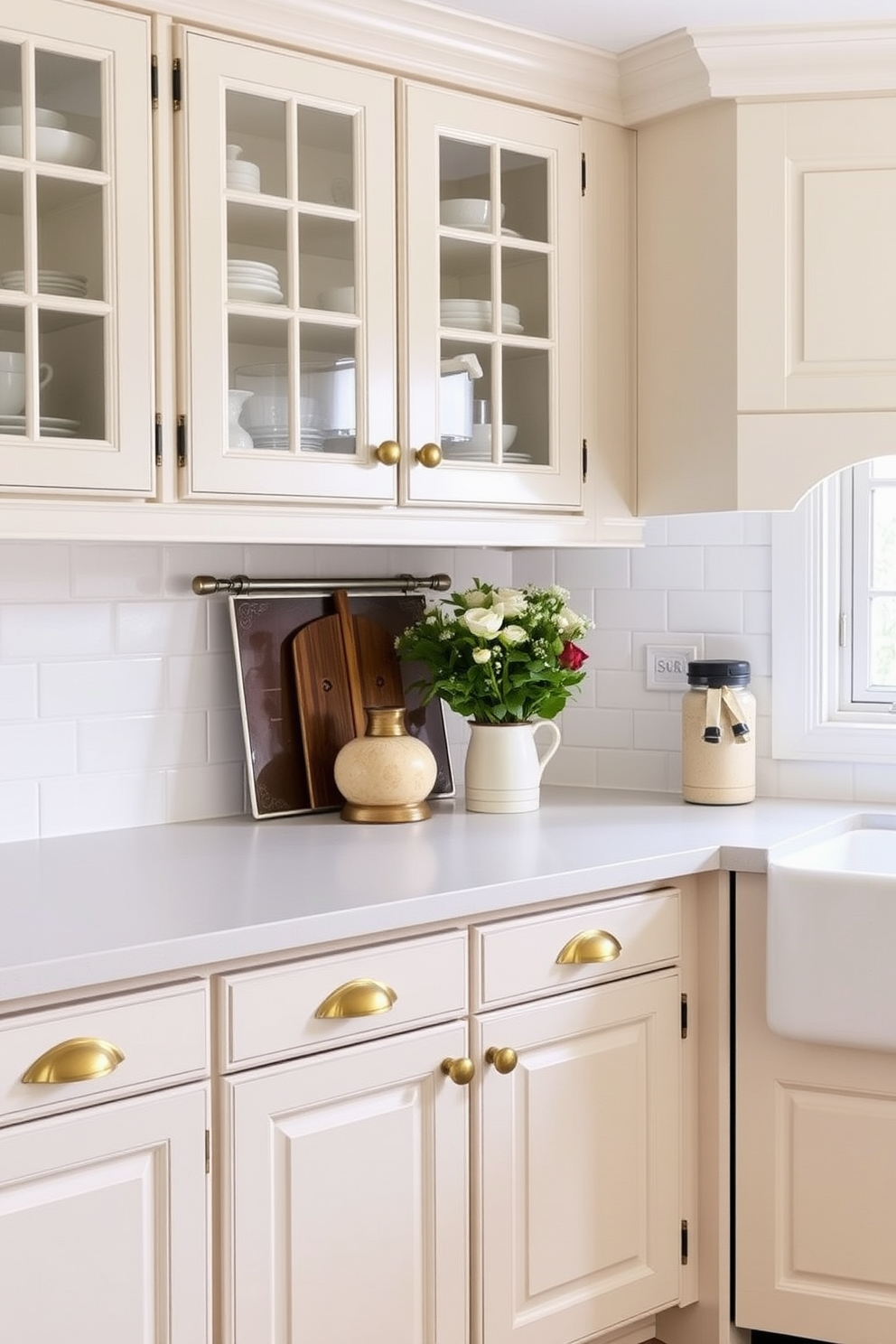 A vintage kitchen design featuring a classic subway tile backsplash in white. The cabinets are painted in a soft pastel color, complemented by brass hardware and a farmhouse sink.