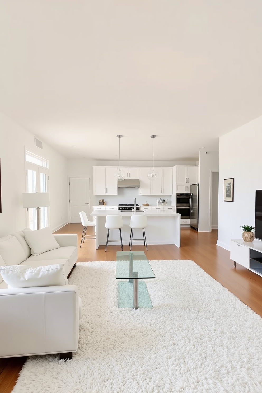 A bright and airy living room featuring a plush white rug that adds warmth to the space. The room is decorated with minimalist furniture, including a sleek white sofa and a glass coffee table, creating an inviting atmosphere. A modern kitchen with white cabinetry and stainless steel appliances, complemented by a white rug that ties the room together. The open layout allows for easy movement, while pendant lights add a touch of elegance above the island.