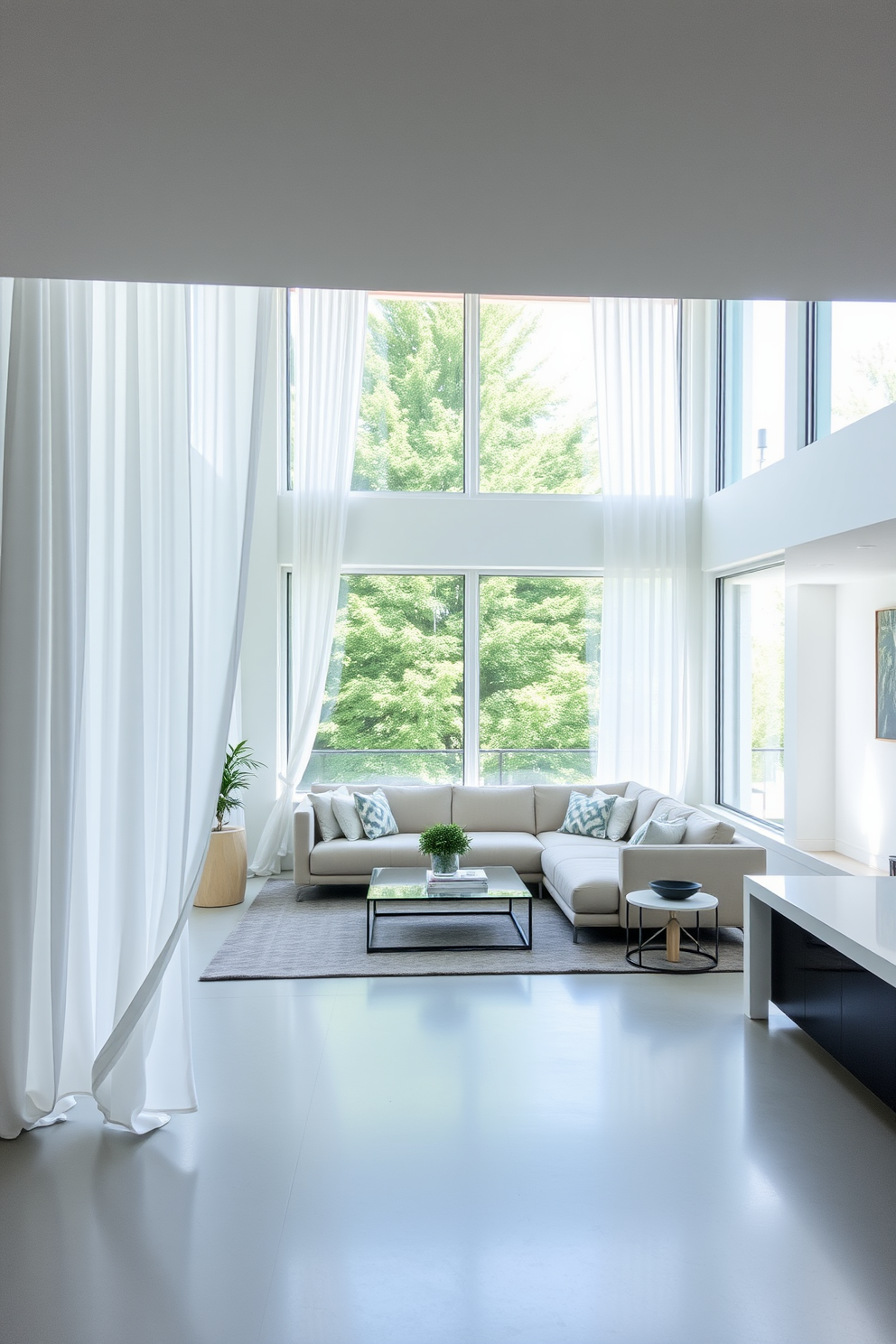 A luxurious white basement designed for comfort features plush white throw blankets draped over a deep sectional sofa. The walls are painted in a soft gray, and large windows allow natural light to fill the space, enhancing the serene atmosphere.