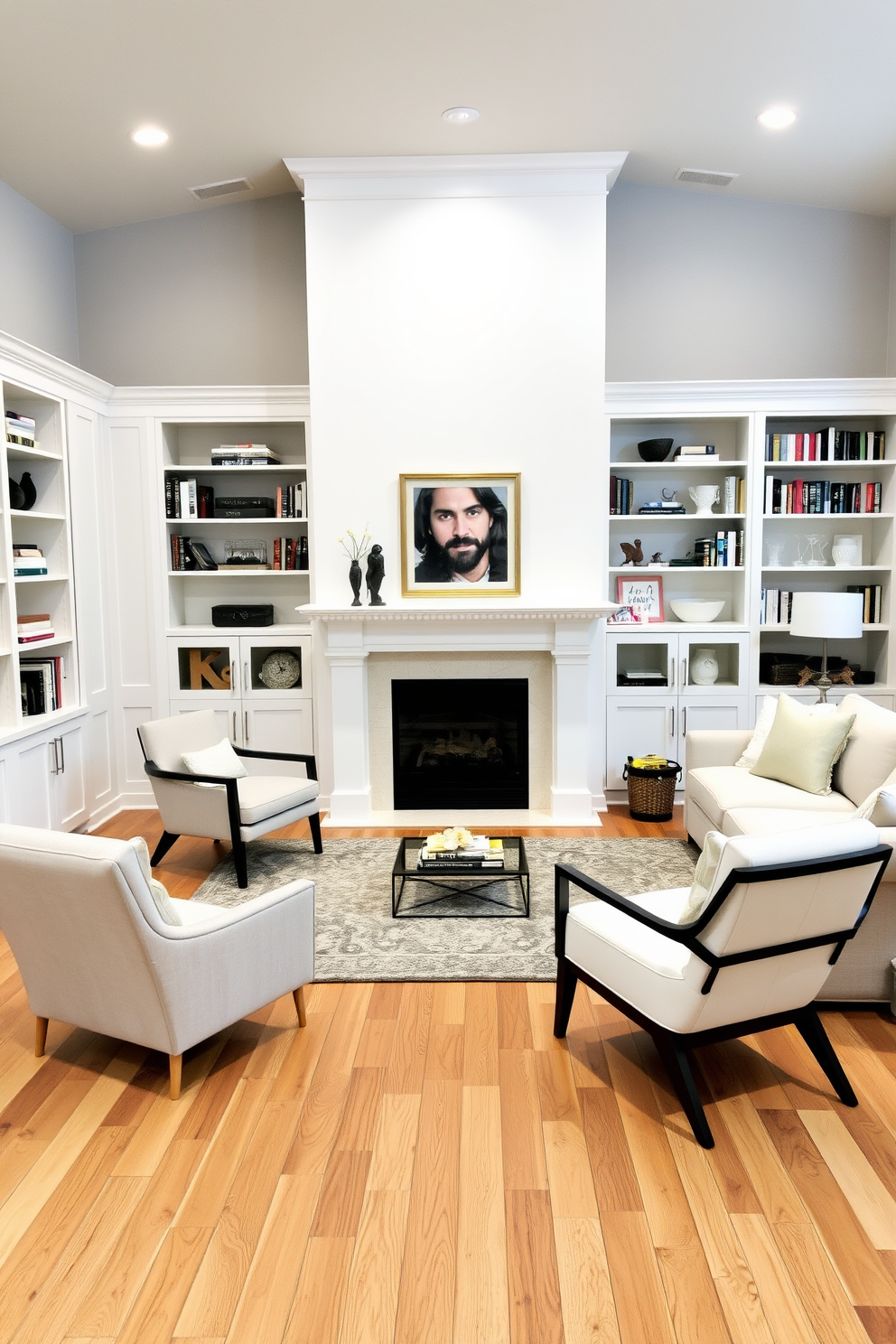 A stunning white fireplace serves as the focal point of the basement, surrounded by built-in shelves filled with books and decorative items. The walls are painted in a soft gray, while the floor features wide plank hardwood that adds warmth to the space. The seating area includes a plush sectional sofa in a light fabric, complemented by a pair of modern accent chairs. A large area rug anchors the seating arrangement, creating a cozy atmosphere perfect for entertaining or relaxing.