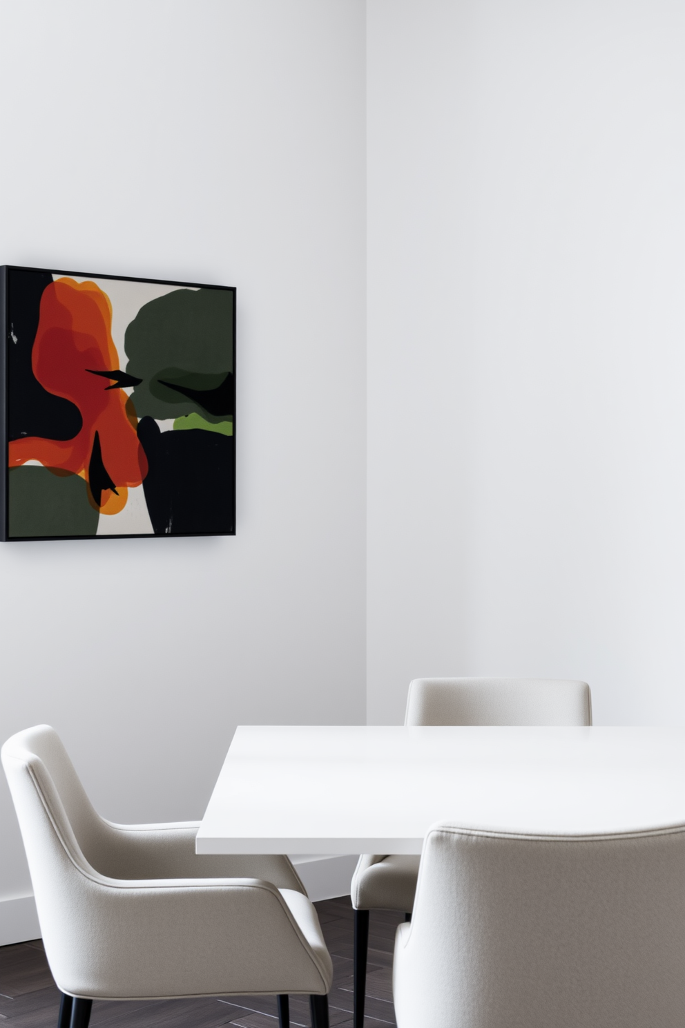 A contemporary dining space features a sleek white table surrounded by elegant upholstered chairs. A bold piece of modern art hangs on the wall, adding a splash of color to the minimalist decor.