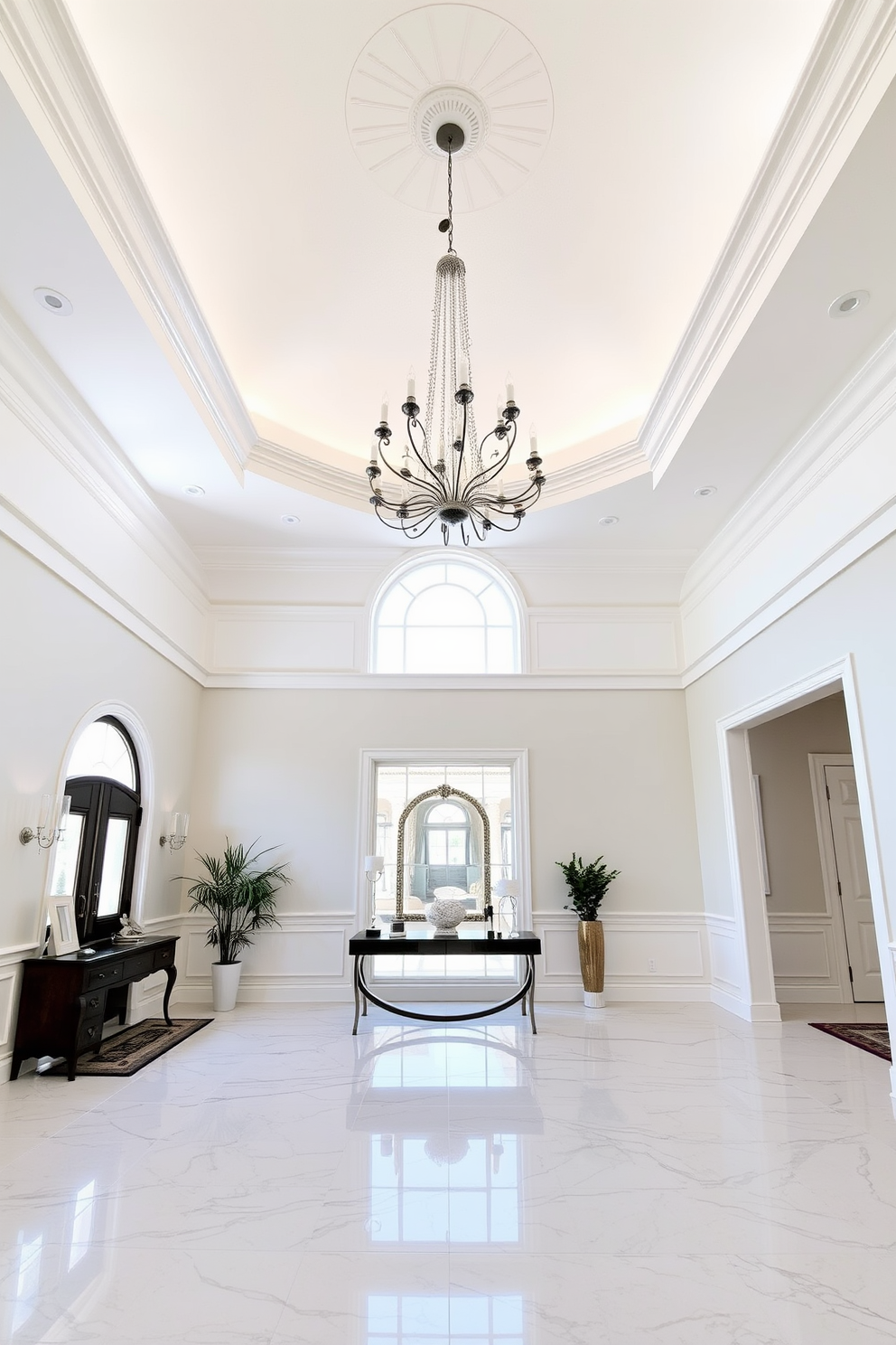 Bright white ceiling with a stylish chandelier that serves as a focal point in the room. The walls are painted in a soft pastel hue, complementing the elegant flooring made of polished marble. A spacious foyer welcomes guests with a large console table adorned with decorative accents. Natural light floods the space through a large window, enhancing the airy and inviting atmosphere.