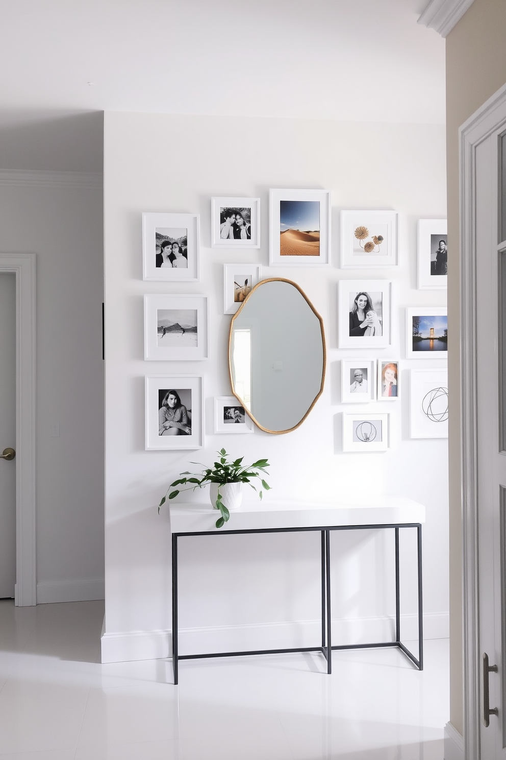 A gallery wall adorned with white framed pictures showcasing a variety of art styles and family photos creates a focal point in the room. The frames are arranged in a harmonious layout, with varying sizes and orientations that draw the eye and add a personal touch to the space. The foyer features a bright and inviting design with white walls and a sleek console table. A stylish mirror hangs above the table, reflecting natural light, while a potted plant adds a touch of greenery to the welcoming atmosphere.