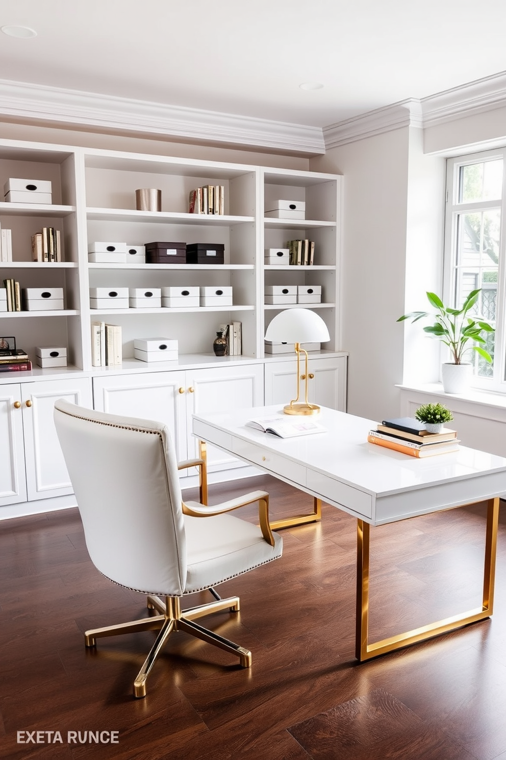 A spacious home office featuring a white desk with gold accents and a plush white chair. The walls are painted in a crisp white, and a large window allows natural light to fill the room. On the desk, there is a sleek gold lamp and a few decorative books arranged neatly. A white bookshelf filled with stylish storage boxes and a small potted plant adds a touch of greenery to the elegant space.