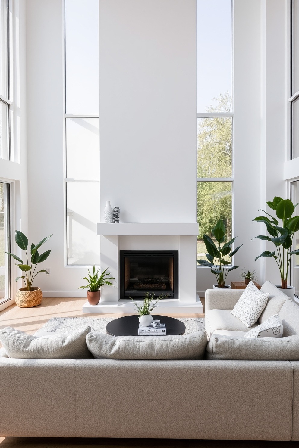 Bright white fireplace as a focal point. The fireplace is surrounded by a sleek white mantel and complemented by a cozy seating arrangement featuring a plush sectional sofa in soft gray. Large windows allow natural light to flood the space, enhancing the airy atmosphere. Accents of greenery from potted plants add a touch of freshness to the minimalist decor.