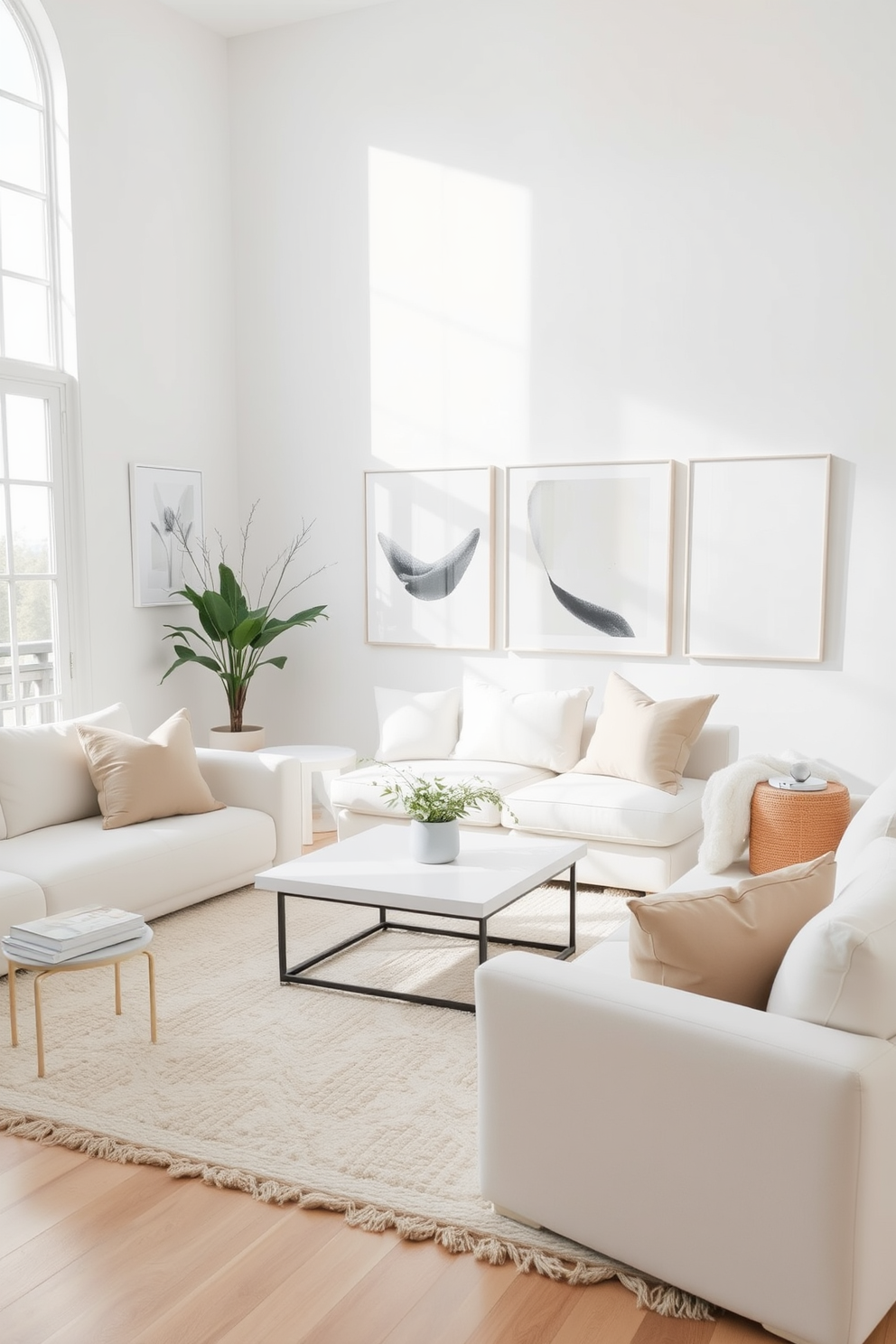 A serene living room featuring white decor with neutral artwork adorning the walls. The space includes a plush white sofa, a minimalist coffee table, and a soft area rug, creating an inviting atmosphere. Natural light floods the room through large windows, highlighting the subtle textures of the furnishings. Accent cushions in muted tones add warmth and depth to the overall aesthetic.