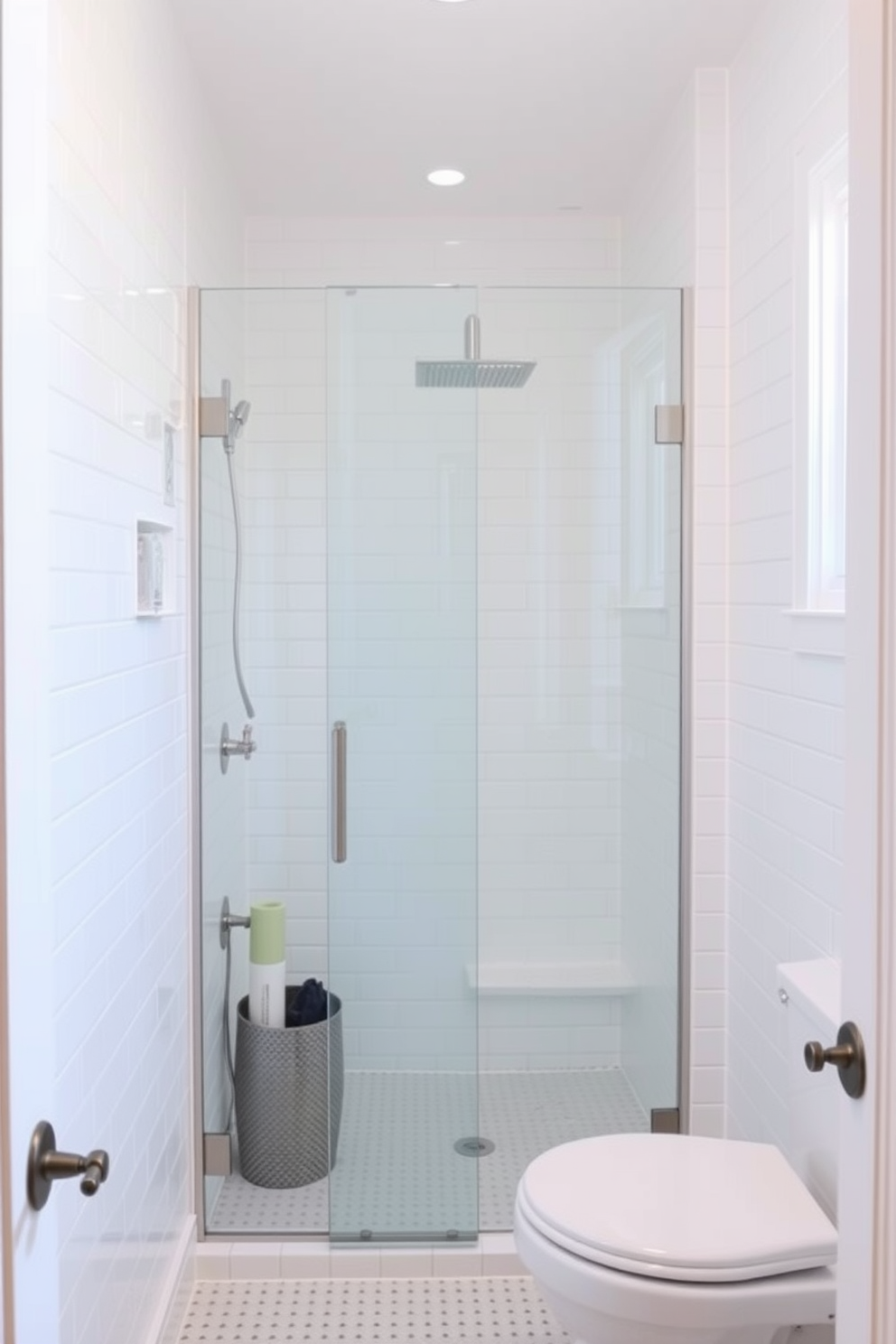 A bright and airy powder room features a sleek glass shower door that enhances the open feel of the space. The walls are adorned with soft white tiles, creating a clean and elegant backdrop for stylish fixtures and accessories.