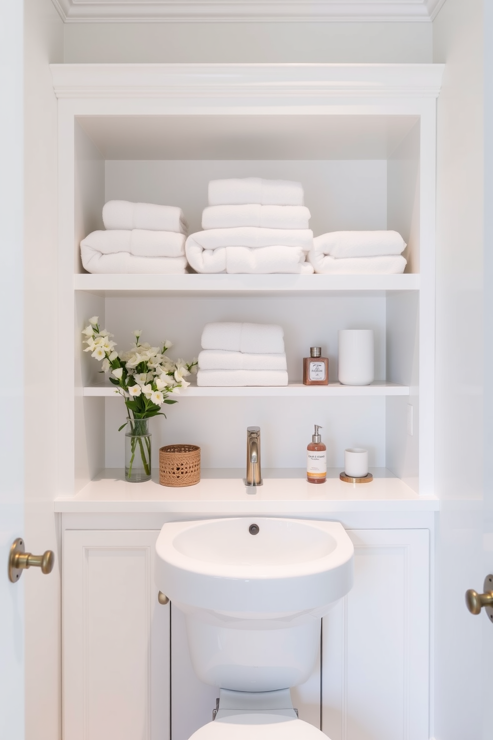 A chic powder room featuring an elegant white sink with curved edges. The walls are adorned with soft grey wallpaper, creating a serene ambiance. A sleek, modern mirror with a minimalist frame hangs above the sink. The floor is tiled with large, light-colored ceramic tiles, enhancing the room’s spacious feel.