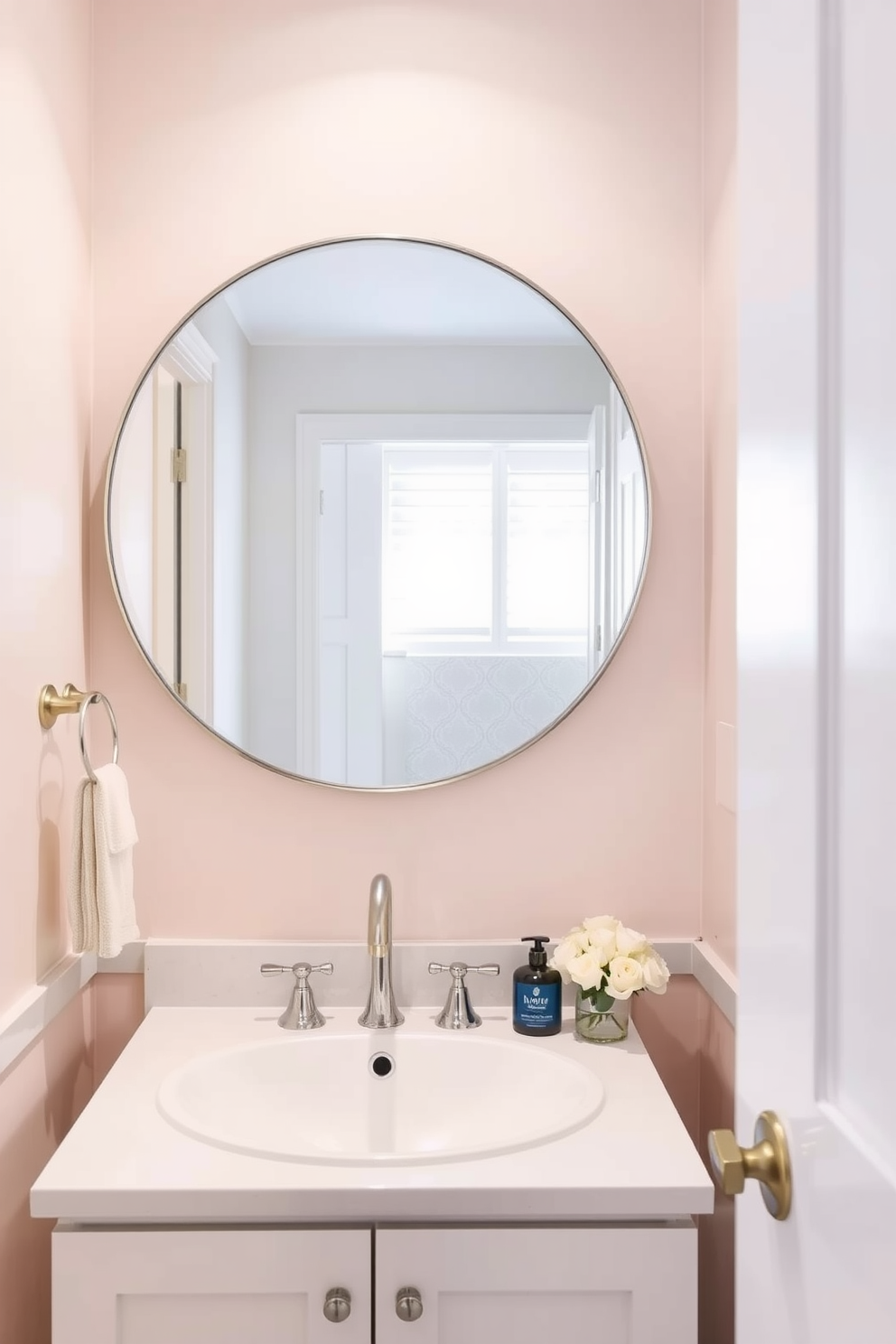 A minimalist white powder room features cabinetry with clean lines and sleek fixtures that create an uncluttered aesthetic. The walls are adorned with subtle textures, enhancing the serene atmosphere while maintaining a bright and airy feel.