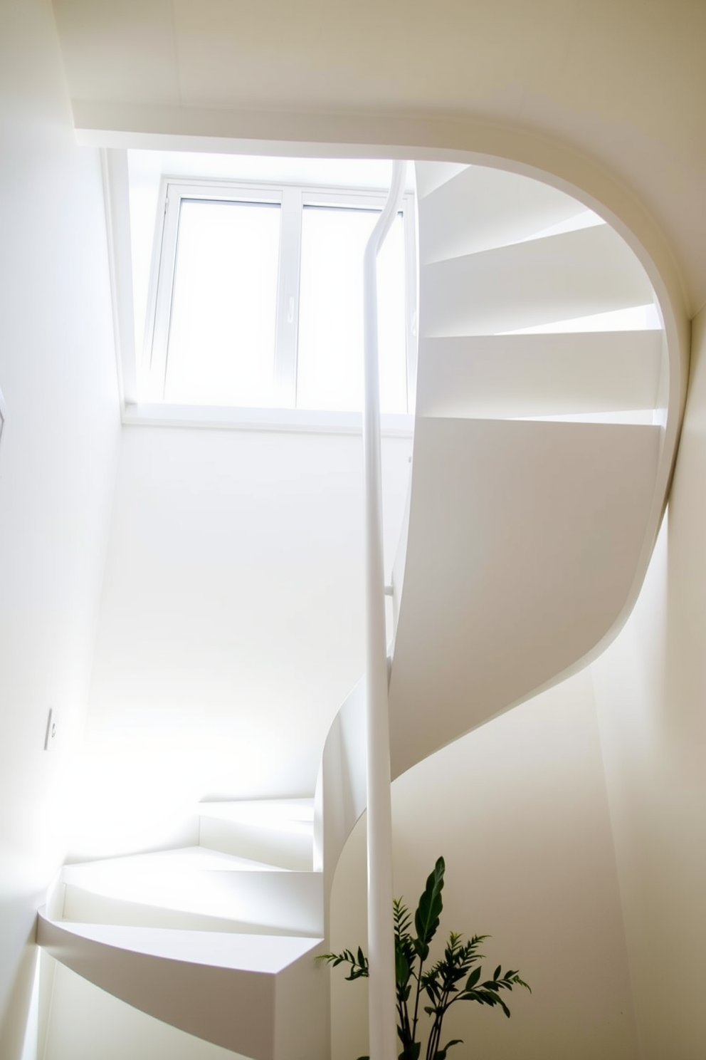 A white spiral staircase elegantly winds upward, designed for compact spaces. The sleek, minimalist structure features a smooth finish and is complemented by a modern railing that enhances its contemporary appeal. The staircase is surrounded by soft natural light streaming through a nearby window, creating a bright and airy atmosphere. Below, a small potted plant adds a touch of greenery, harmonizing with the staircase's clean lines and bright color.