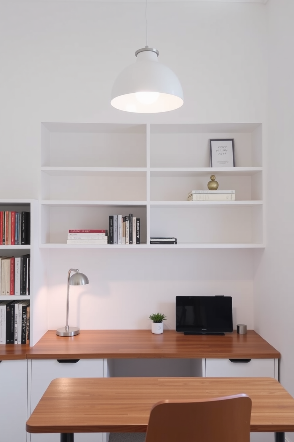 Chic pendant lighting hangs gracefully above a sleek wooden desk in a bright white study room. The walls are painted a crisp white, complemented by minimalist shelving that displays books and decorative items.