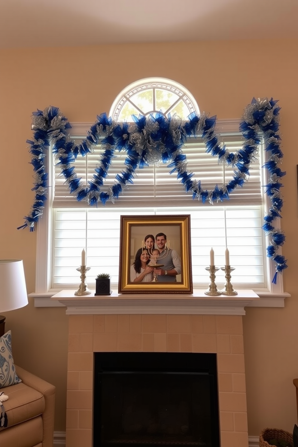 A warm and inviting living room featuring a beautifully framed family menorah photo displayed prominently on the mantel. The window is adorned with festive Hanukkah decorations, including blue and silver garlands that add a cheerful touch to the space.