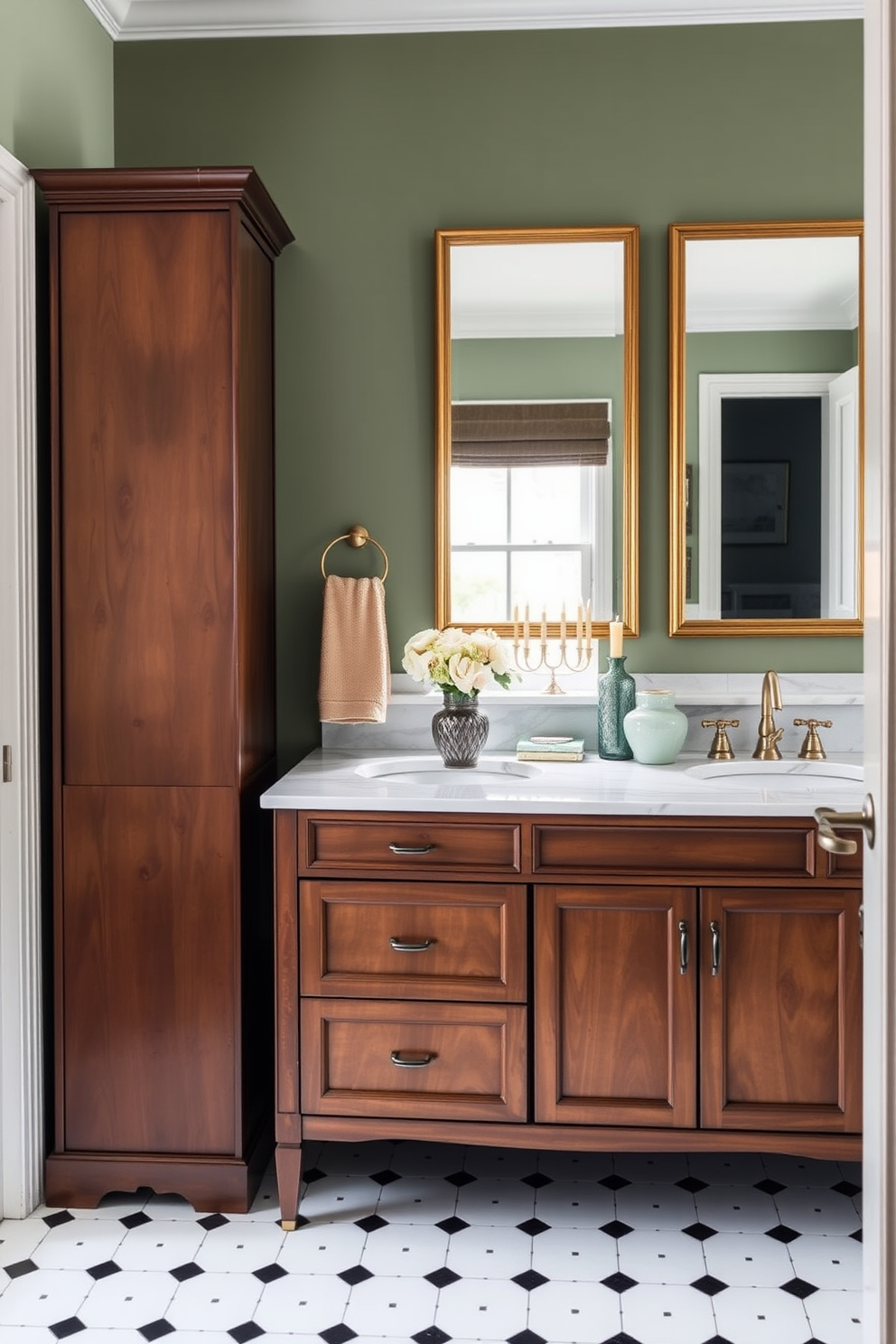 A sophisticated bathroom setting features a wooden vanity with a marble countertop that accommodates two sinks. Above the countertop, two rectangular mirrors with gold frames hang side by side, reflecting the serene ambiance. To the left of the vanity, a tall wooden cabinet adds storage and elegance. The walls are painted in a muted green shade, complemented by a floor of white and black patterned tile. A decorative vase with flowers is placed on the countertop, while a beige towel hangs from one of the sink faucets. On the window sill, an arrangement of candles creates a warm and inviting atmosphere, perfect for relaxation and tranquility. For a festive touch, consider incorporating Hanukkah decorating ideas that enhance the overall aesthetic of the space. Subtle blue and silver accents can be introduced to celebrate the holiday while maintaining the sophisticated design.