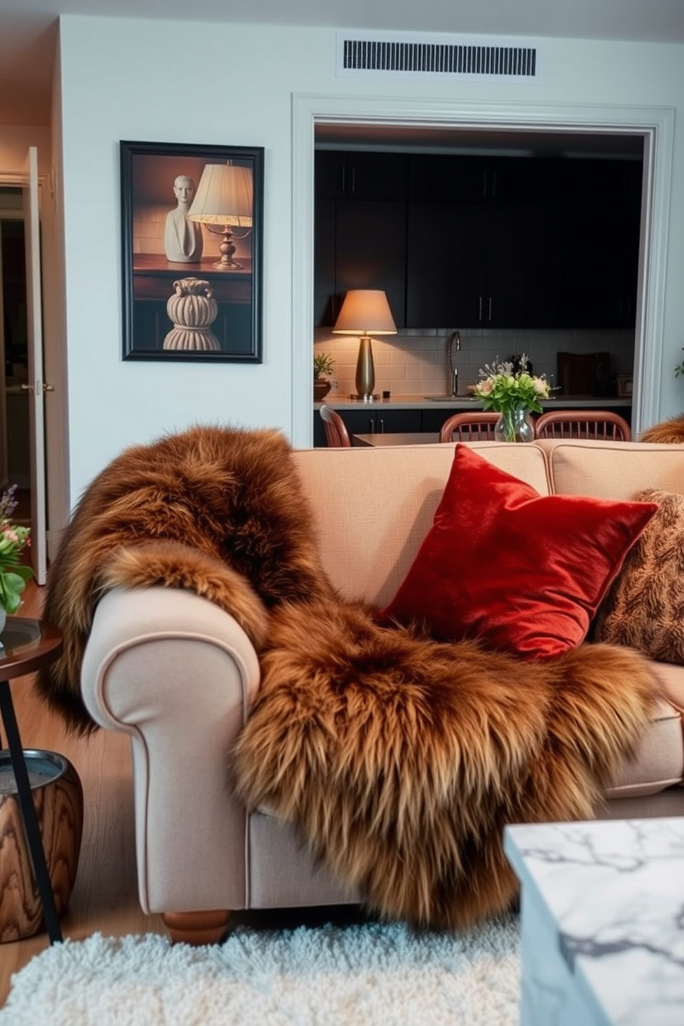 A cozy winter apartment setting featuring furniture adorned with faux fur accents. The living room includes a plush sofa draped with a soft faux fur throw, complemented by decorative pillows in rich, warm tones.