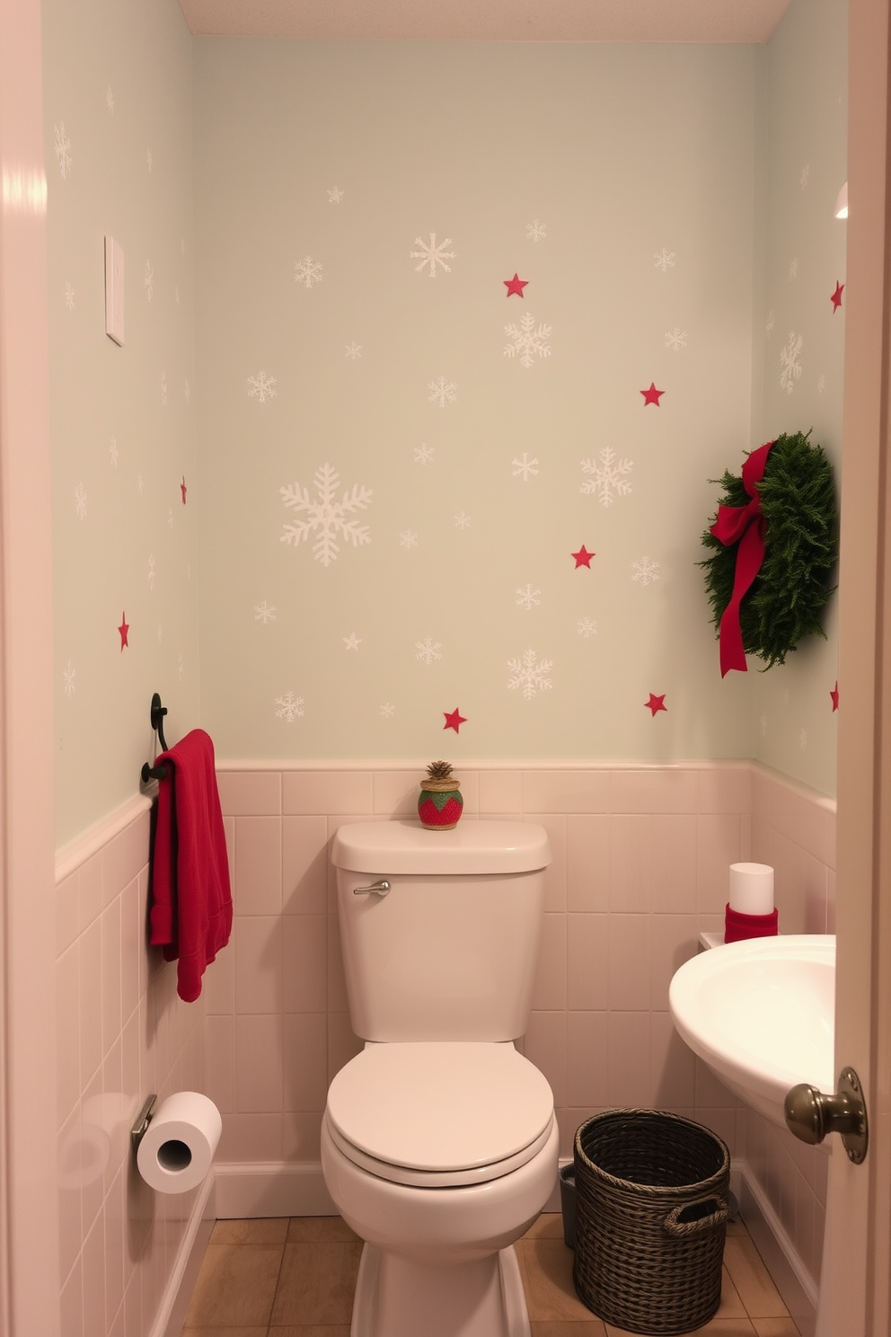 Charming holiday-themed wall decals adorn the walls of a cozy winter bathroom. The decals feature snowflakes and festive motifs, creating a whimsical atmosphere that complements the soft, warm lighting.