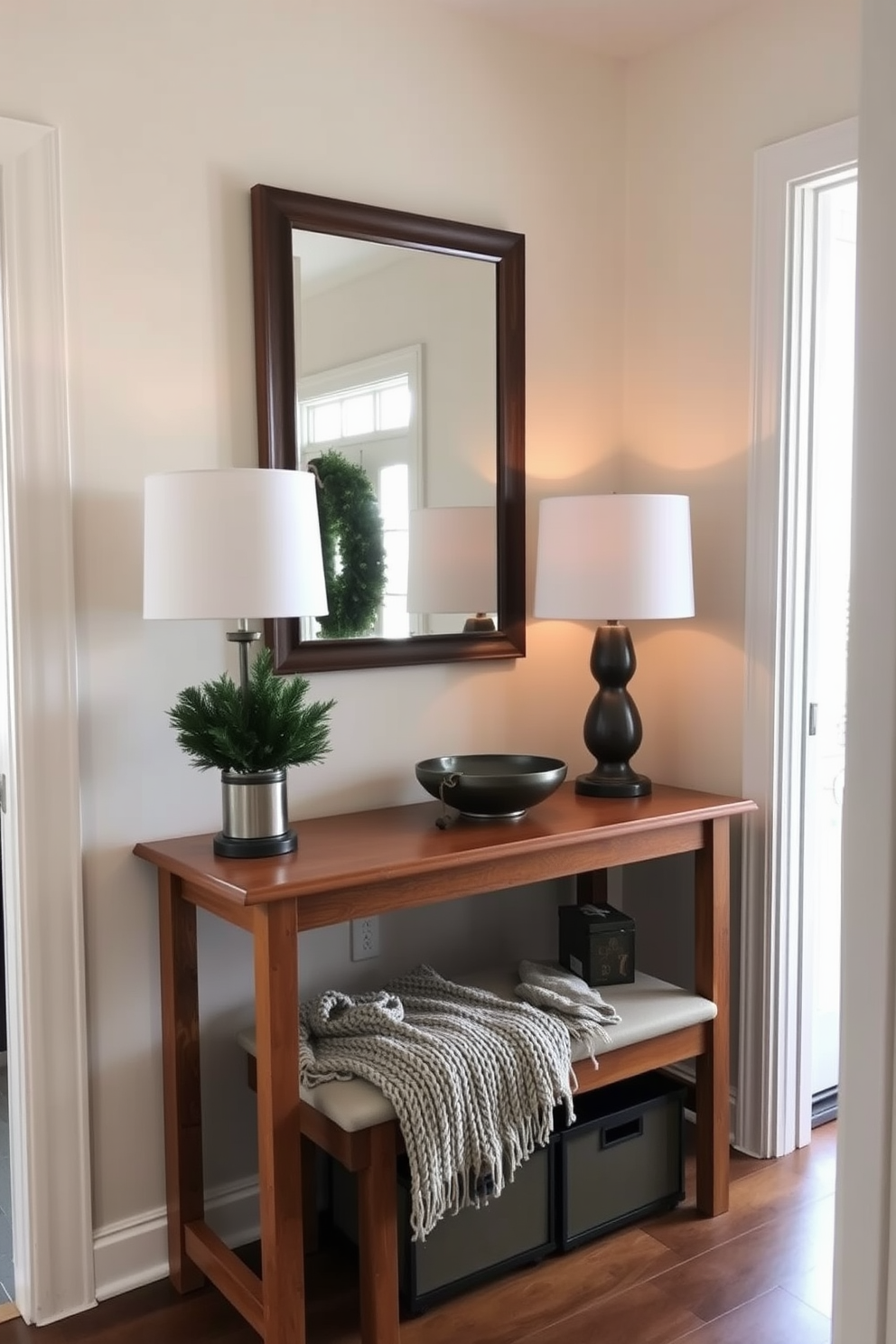 A welcoming entryway space features a warm wooden console table adorned with a stylish lamp and a decorative bowl for keys. A large mirror hangs above the table, reflecting the soft light from a nearby window that brightens the area. For winter closet decorating ideas, incorporate cozy textures such as a chunky knit throw draped over a bench. Add seasonal touches like a small evergreen plant and a few decorative storage boxes in festive colors to enhance the inviting atmosphere.