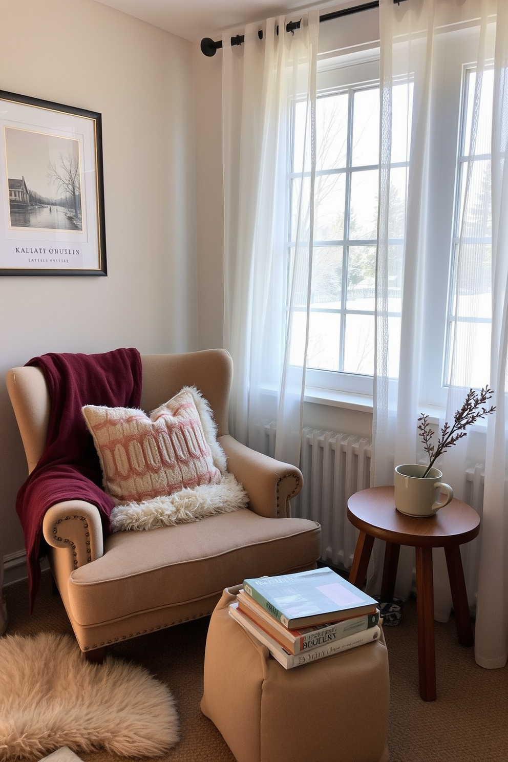 A cozy winter reading nook adorned with soft textures and warm colors. A plush armchair is positioned next to a large window, draped in sheer curtains that let in natural light. A small side table holds a stack of books and a steaming cup of tea. Framed artwork featuring winter landscapes hangs on the walls, adding a personal touch to the serene atmosphere.