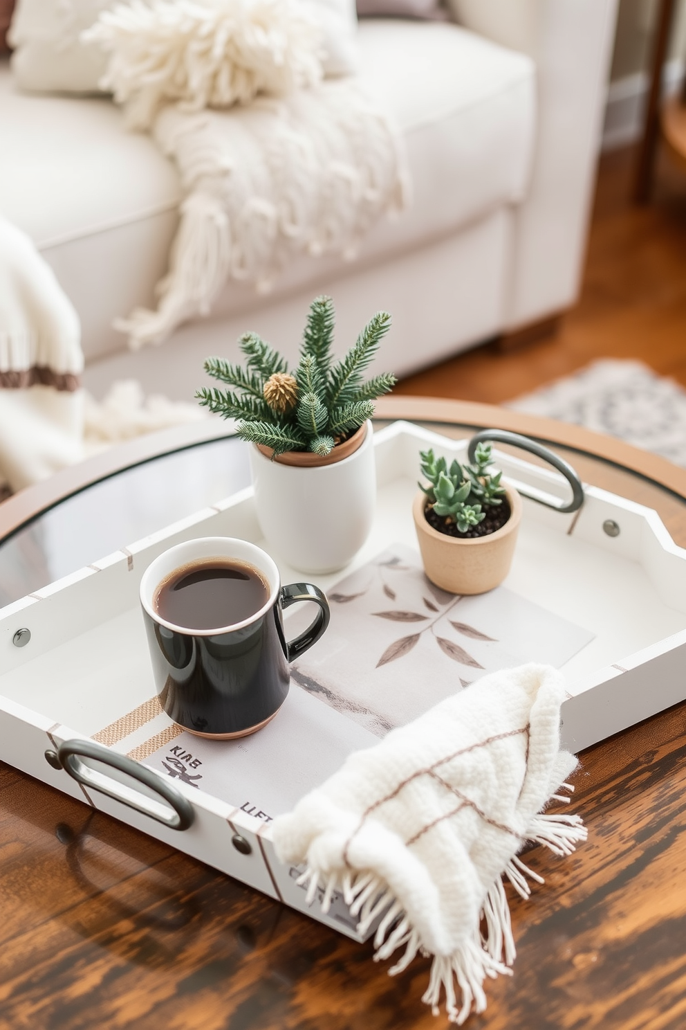 A stylish coffee table is adorned with a chic tray that holds a steaming cup of coffee alongside a small potted plant. The tray's design complements the winter decor, featuring soft textures and cozy accents that enhance the small space's inviting atmosphere.