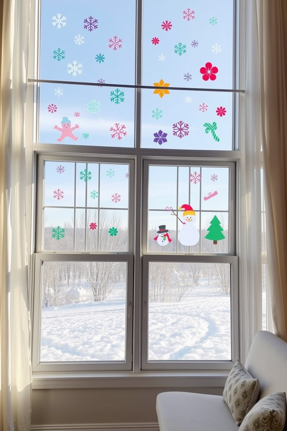 Colorful winter-themed window decals adorn the large windows, creating a festive atmosphere in the room. The decals feature snowflakes, snowmen, and holiday motifs, adding a playful touch to the winter decor. The windows are framed with soft white curtains that gently billow in the breeze. A cozy seating area nearby invites relaxation while enjoying the cheerful winter view outside.