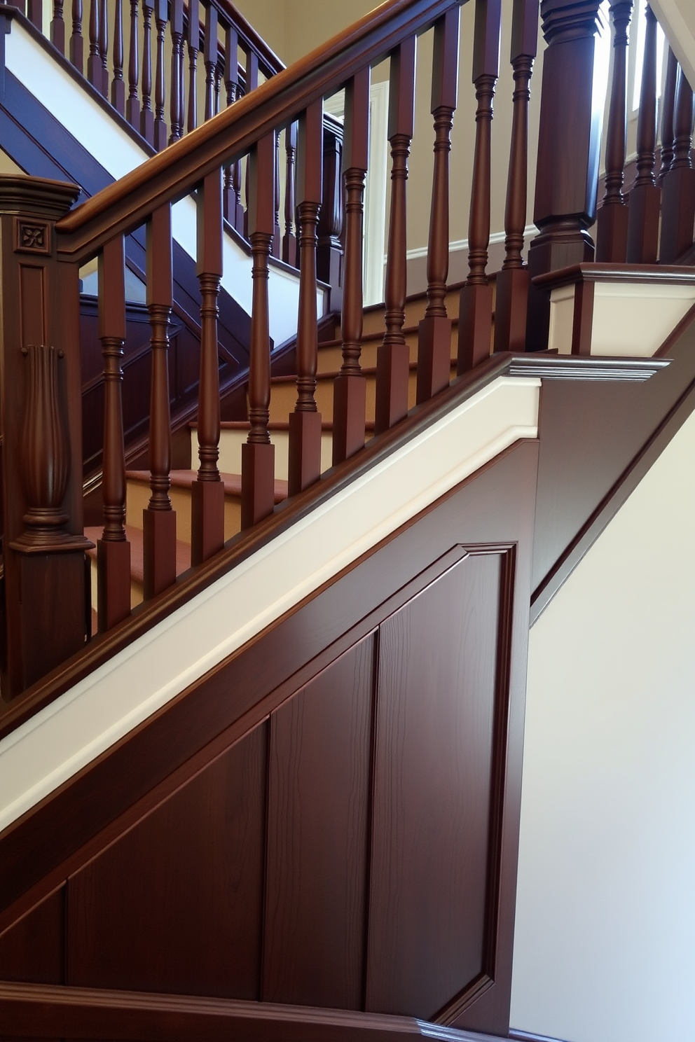 A stunning two-tone staircase features a rich dark wood on the treads and a light, airy hue for the risers. The contrasting colors create a striking visual effect, drawing the eye upward and enhancing the overall elegance of the space. The wooden staircase design incorporates sleek metal railings that complement the wood tones beautifully. Natural light floods the area, highlighting the craftsmanship and inviting a warm, welcoming atmosphere.